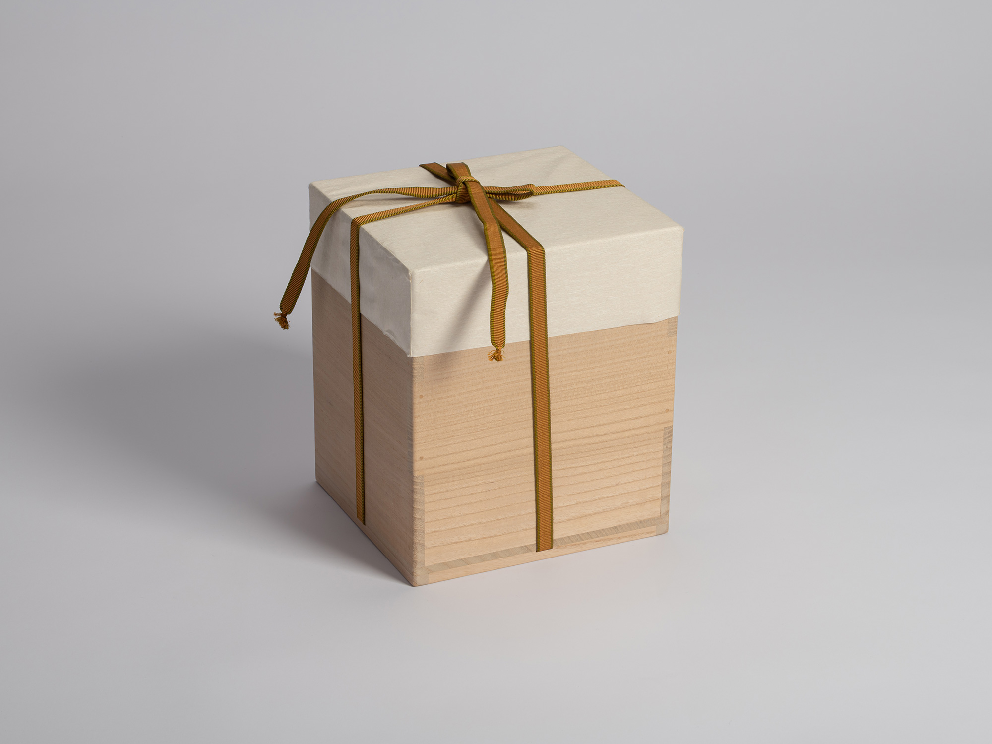 Outermost protective storage box for the tea bowl Musashino by Raku I Chōjirō. The tall rectangular...