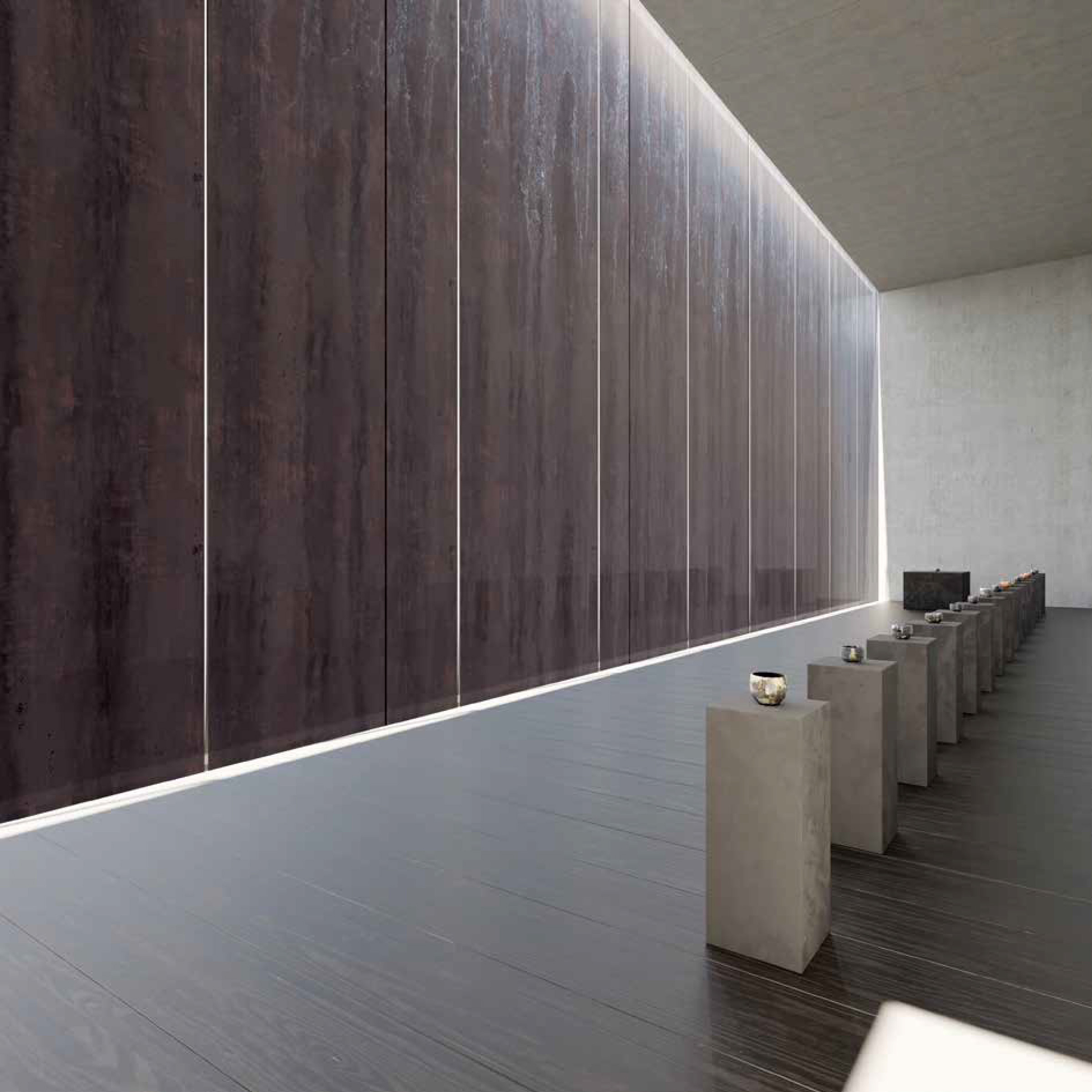 Lower Level Gallery at 309 Magazine St. with glass and weathered steel wall feature