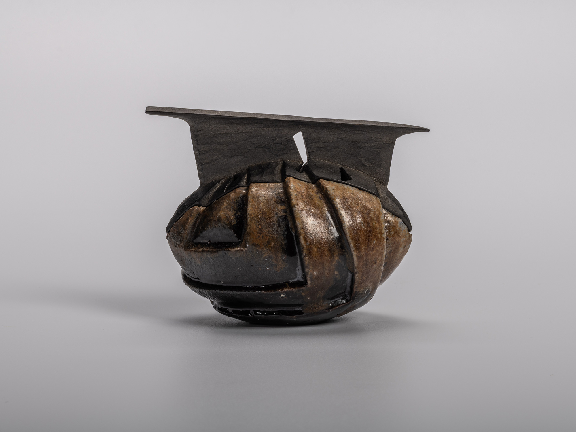 Abstract Black Incense Burner (kōro) by Bizen ceramic artist Ryuichi Kakurezaki. The piece features...