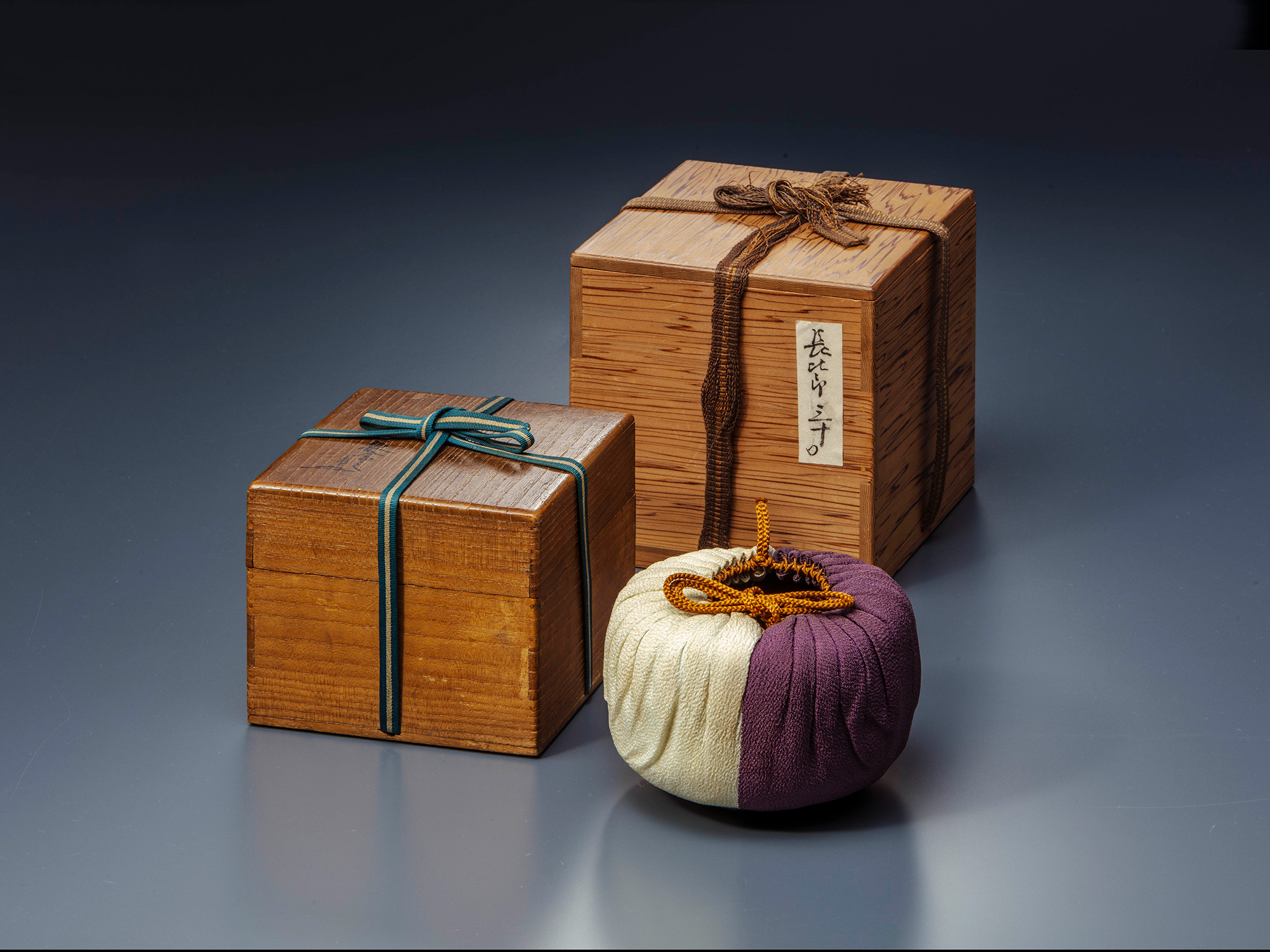 Set of wooden presentation boxes and brocade silk pouch for Chōjirō’s Raku tea bowl Musashino,...