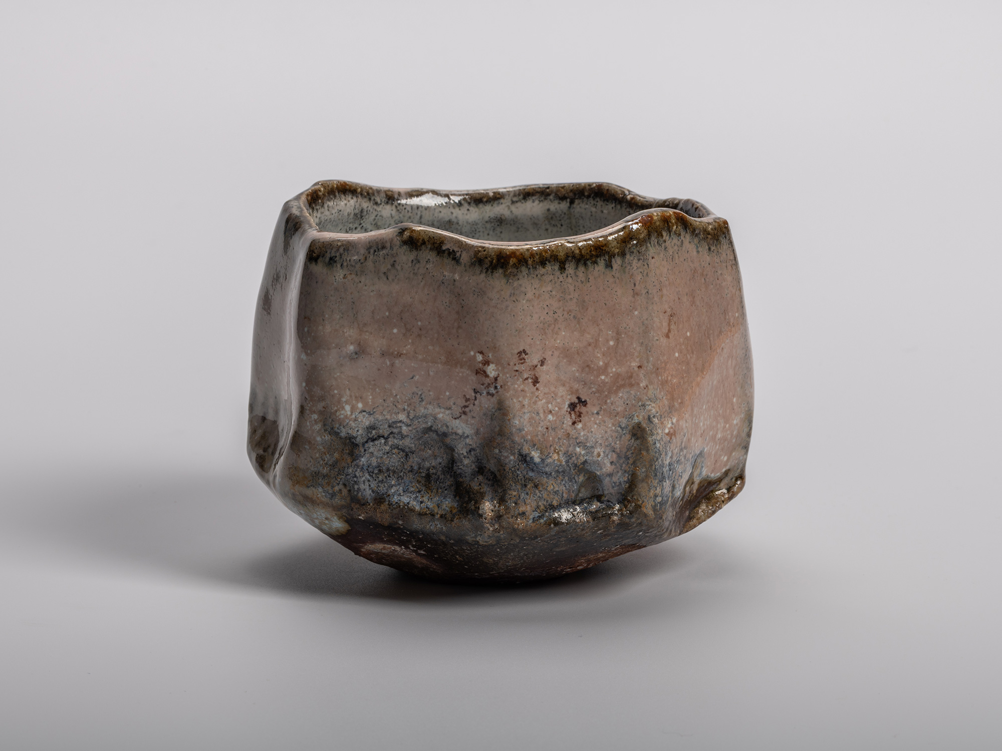 Masanao Kaneta’s Haikaburi Kurinuki tea bowl with hand-carved form, soft ash-fired glaze in gray...