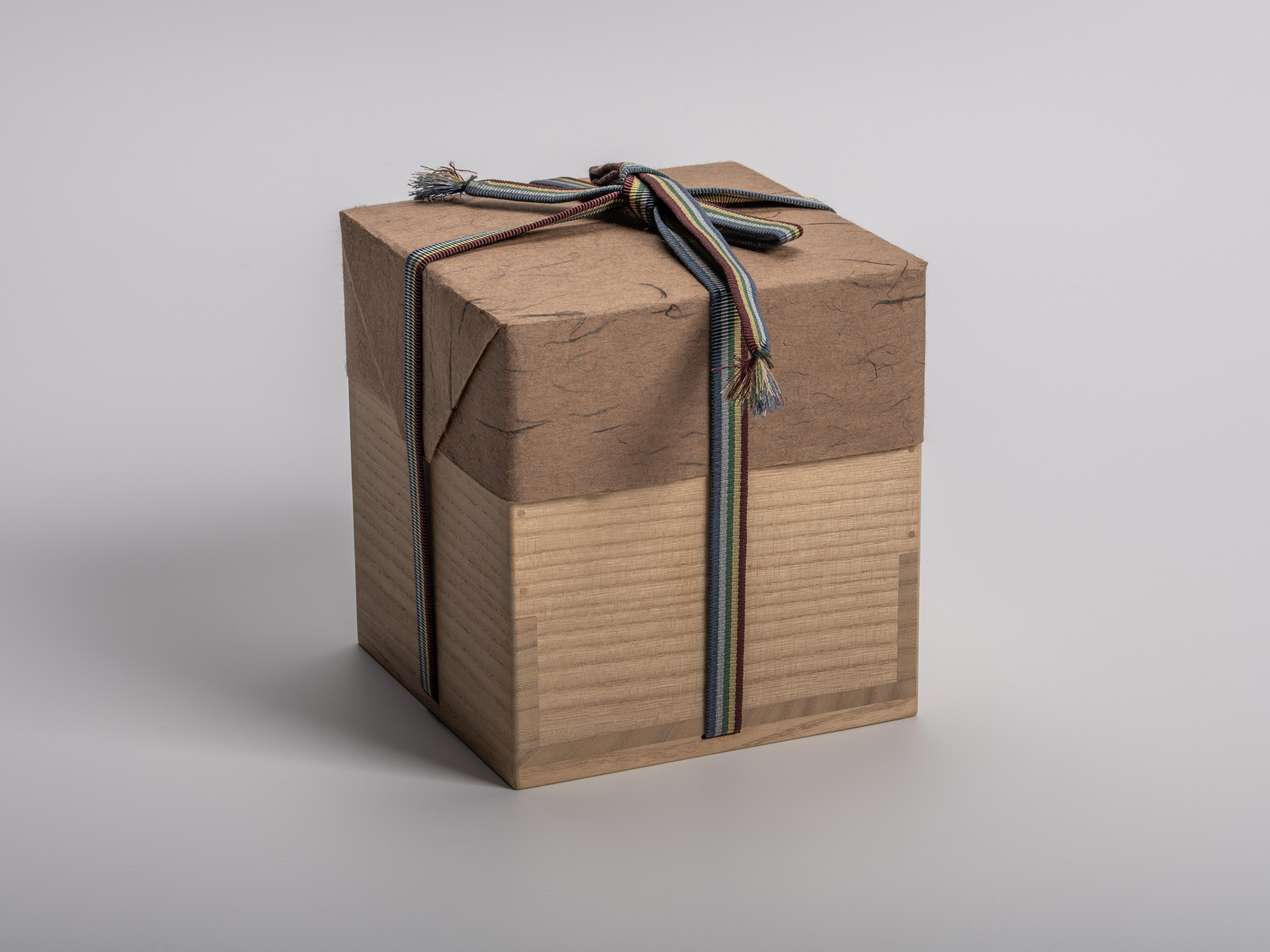 Square wooden tomobako (artist-signed storage box) by ceramic artist Ryuichi Kakurezaki, shown...