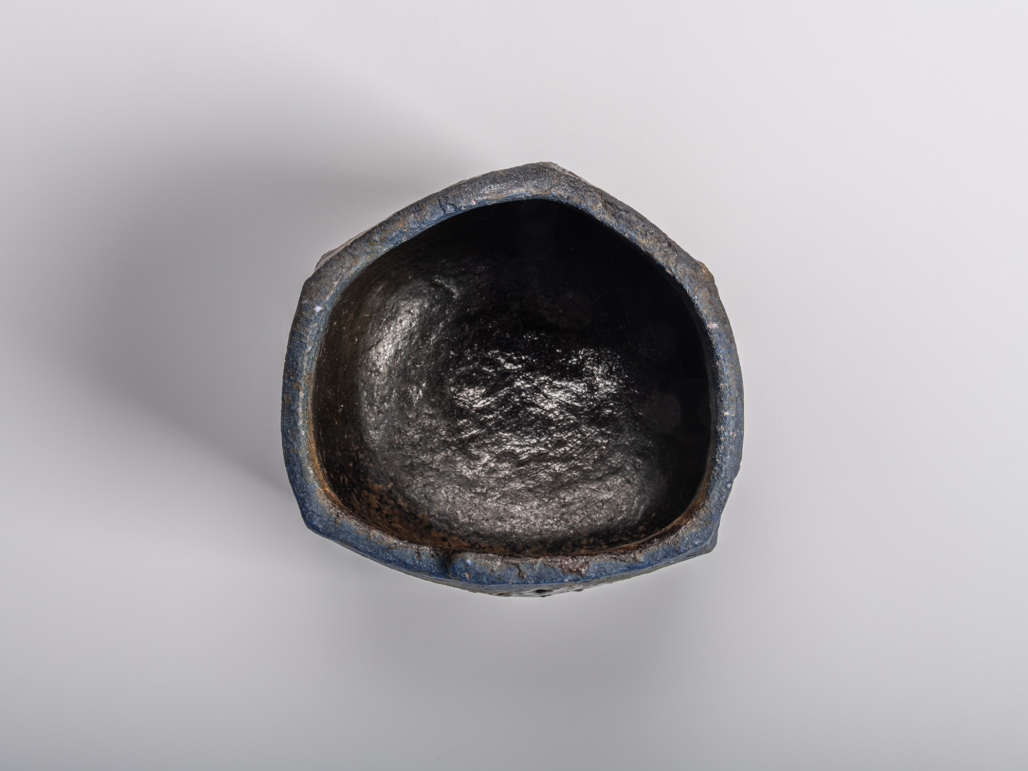Aerial view of interior (mikomi) of Kakurezaki Ryuichi’s tea bowl Una Mistura, showing its asymmetrical...