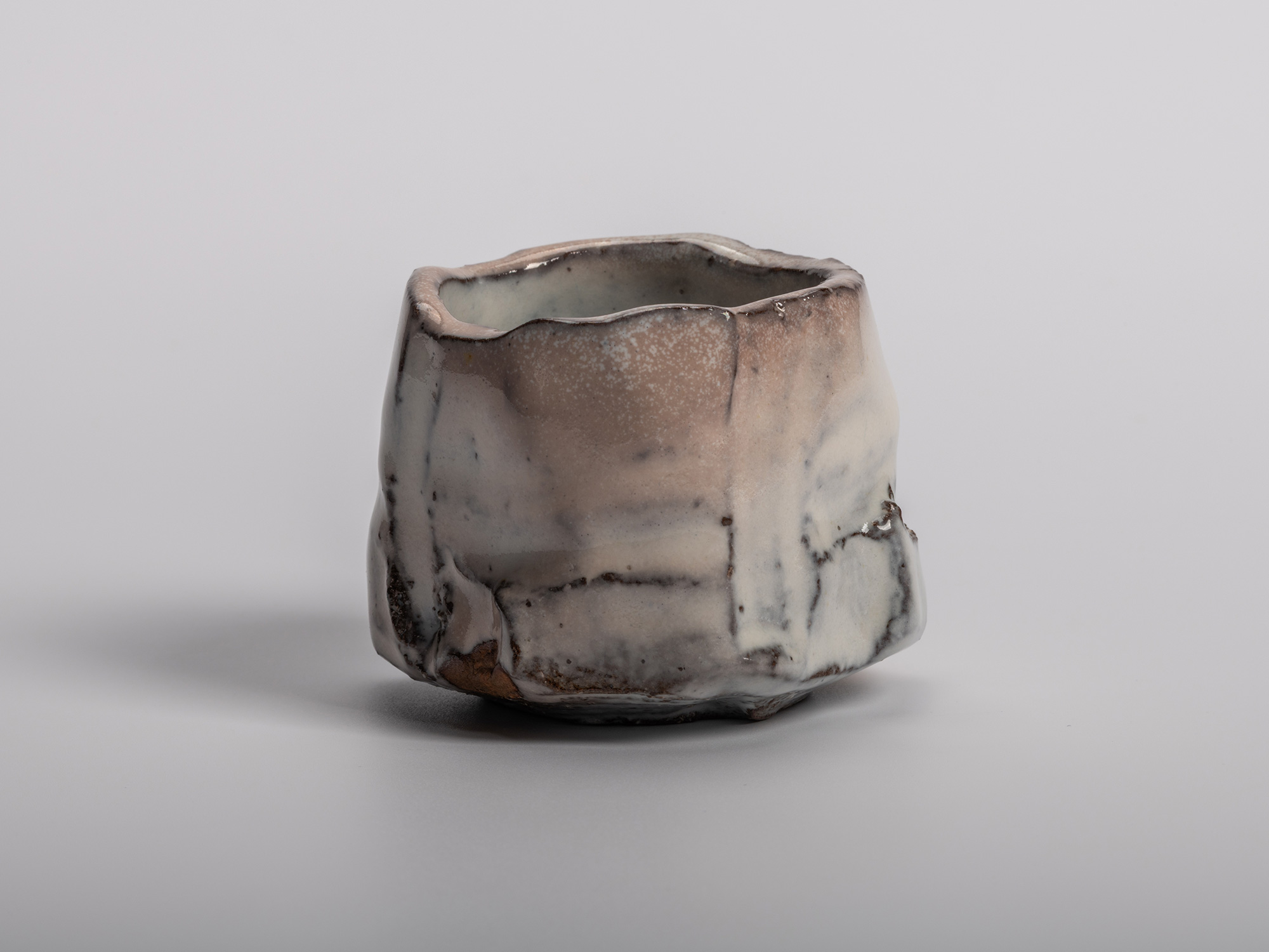 Masanao Kaneta’s White Glaze Youhen Kurinuki Guinomi with hand-carved form, soft white youhen glaze,...