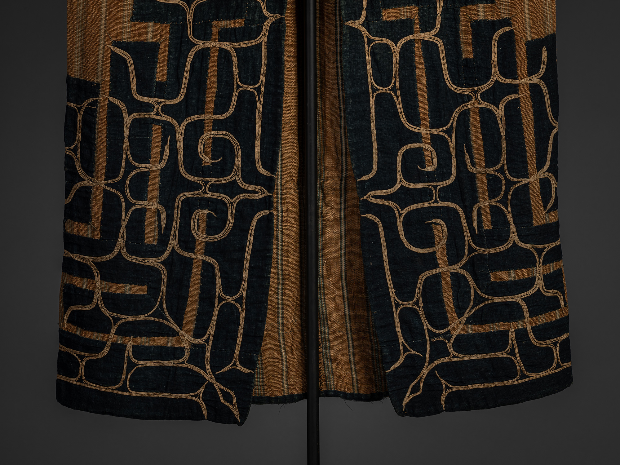 Lower front section revealing interior view of a mid-19th-century Ainu attush robe.