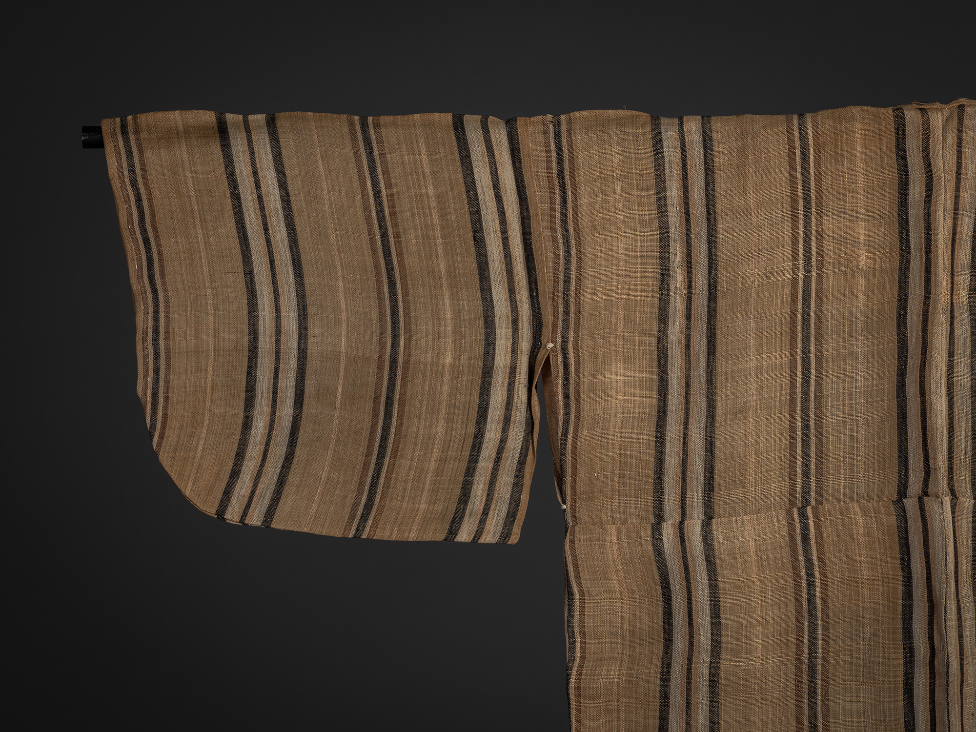 Detail of the left shoulder of a late 19th–early 20th century bashōfu kimono, showing finely woven...