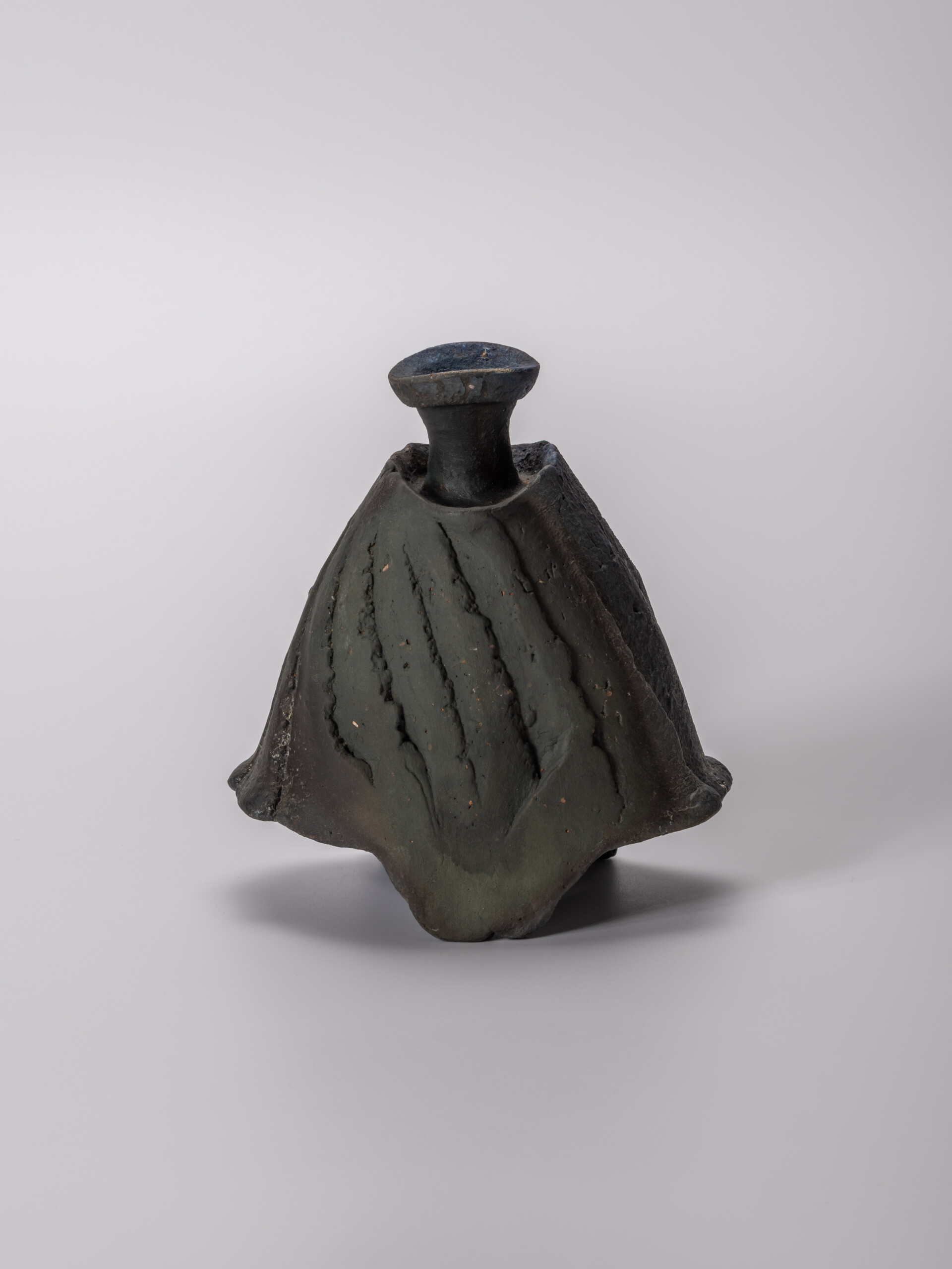 lack tokkuri (sake flask) by Ryuichi Kakurezaki, shown frontally against a neutral background....