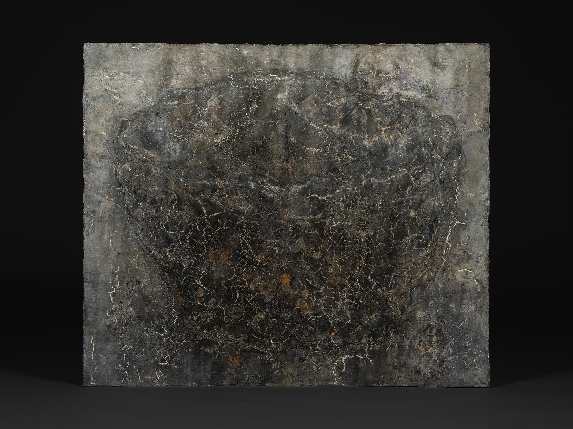 Abstract painting by Hà Mạnh Thắng featuring a dark, stone-like surface with layered black and...