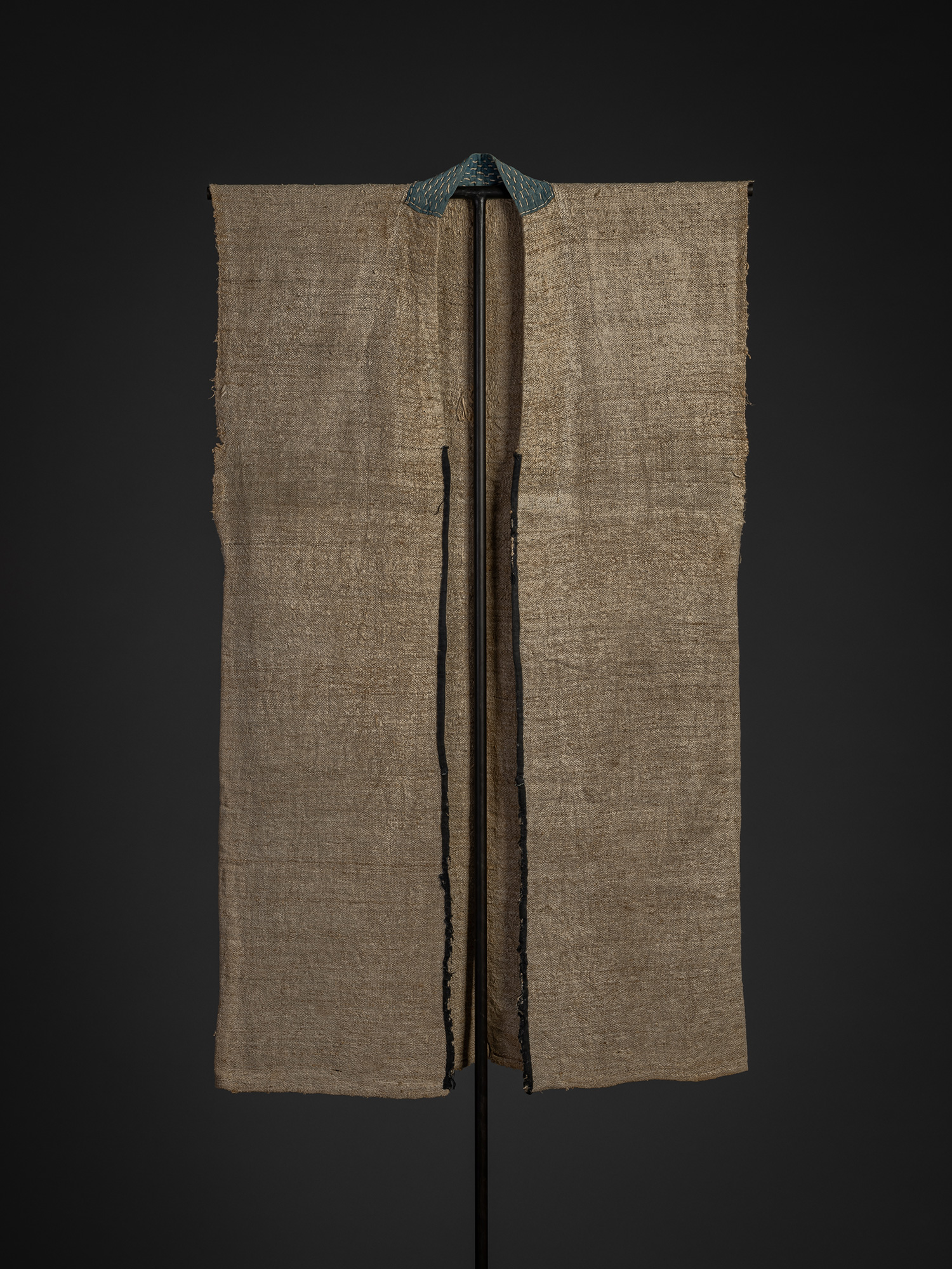 Late 19th-century okusozakkuri garment made of hemp and cotton, featuring a simple rectangular...