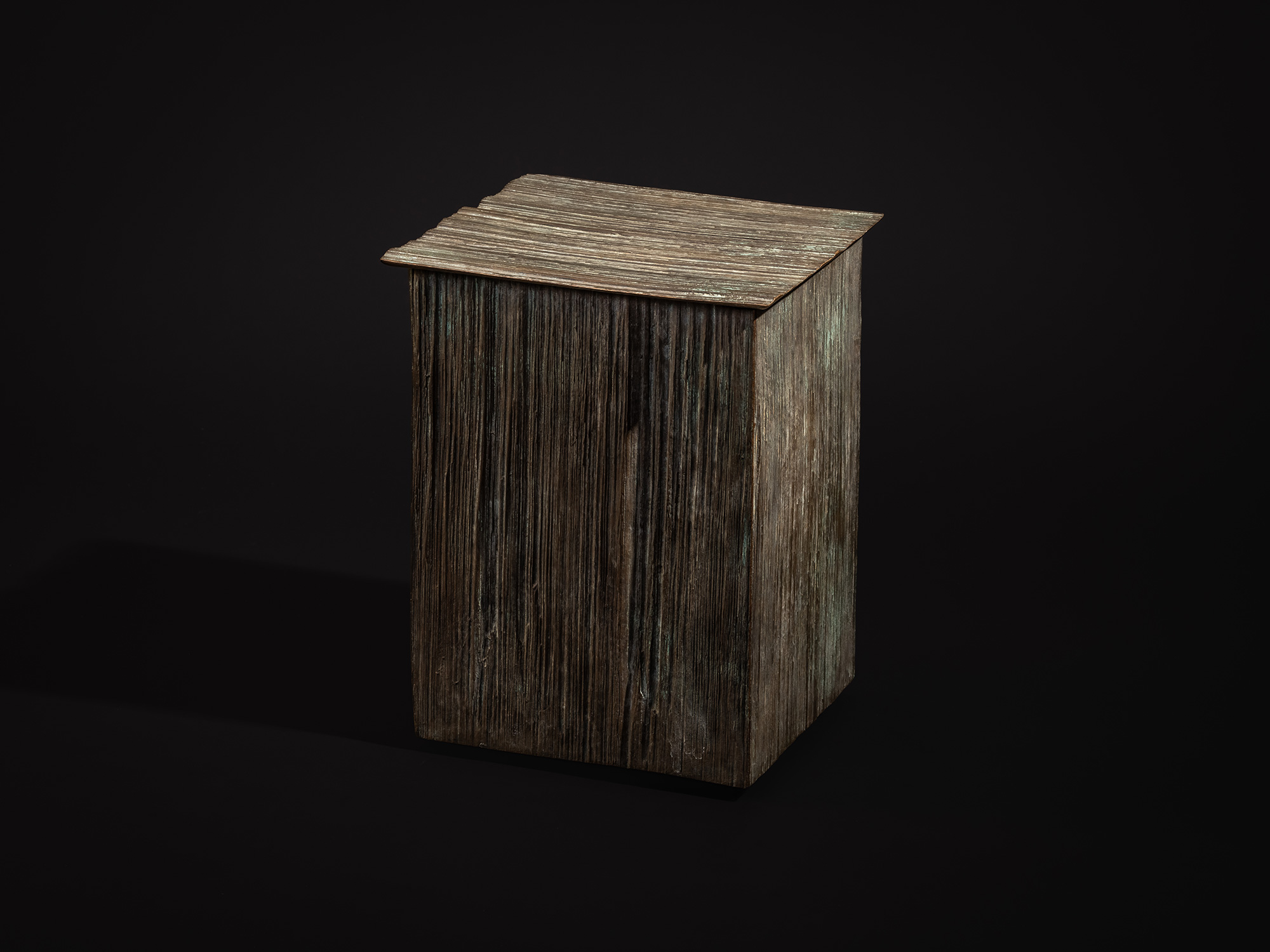 Rectilinear bronze sculpture titled Green Expression by Koji Hatakeyama, featuring a tall, box-like...