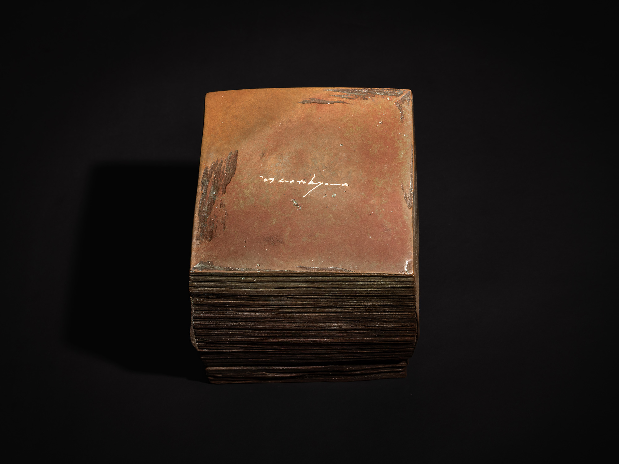 Bottom view of Square Strips by Koji Hatakeyama, showing the underside of the bronze box with the...