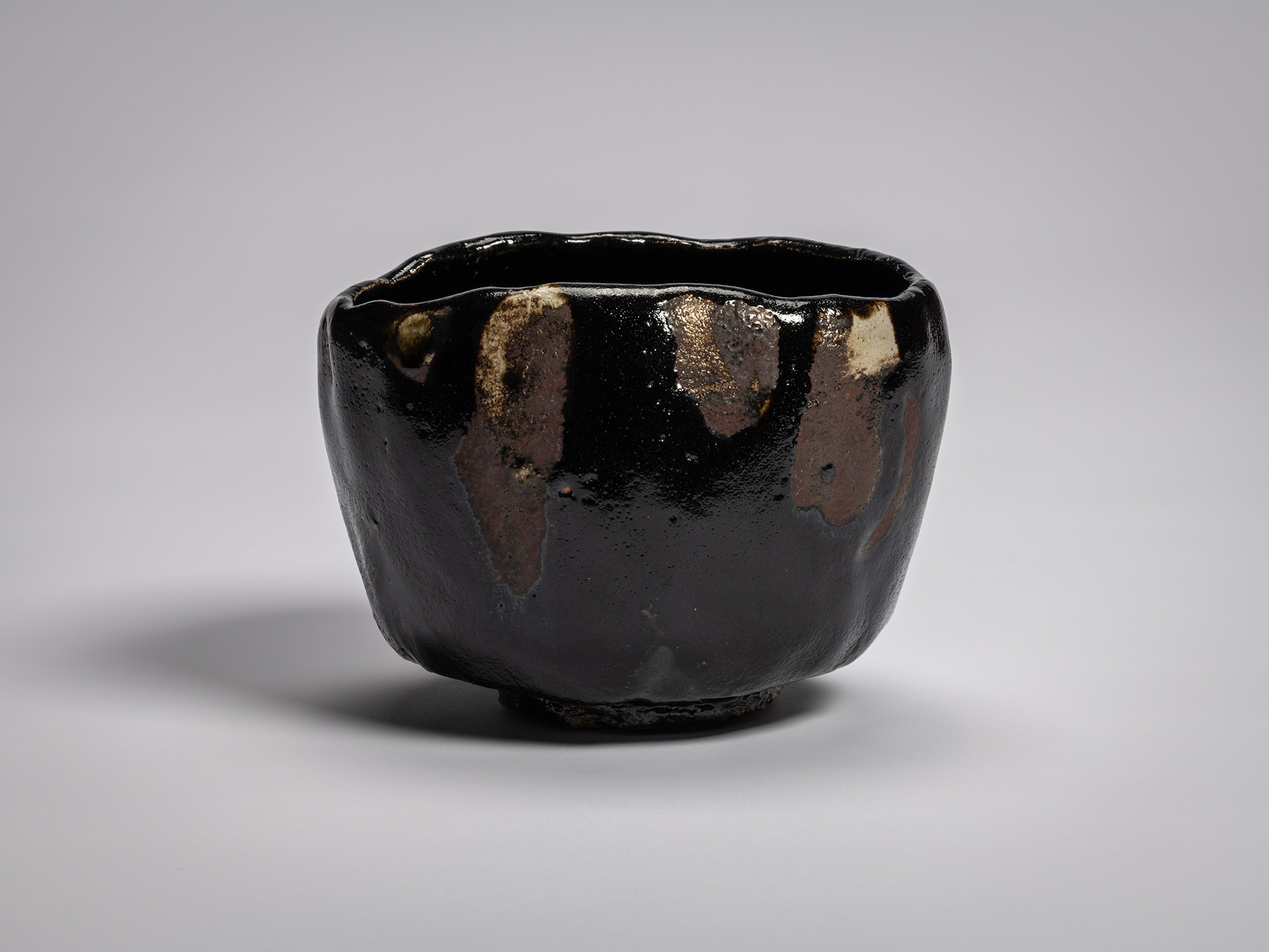 Raku XV tea bowl Usokuseki (“Traces of Rain”) with a hand-formed, slightly tapering cylindrical...