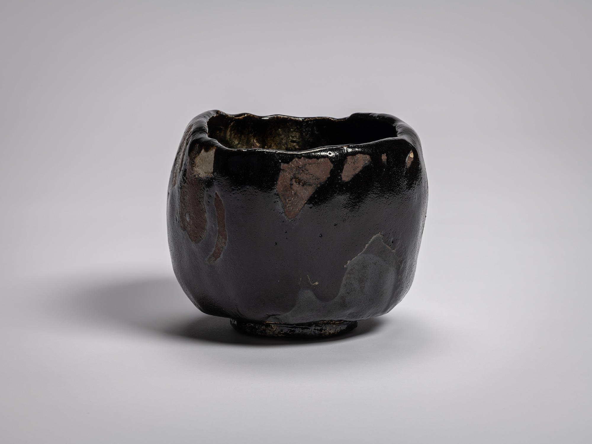Raku XV tea bowl Usokuseki (“Traces of Rain”) with a hand-formed, slightly tapering cylindrical...
