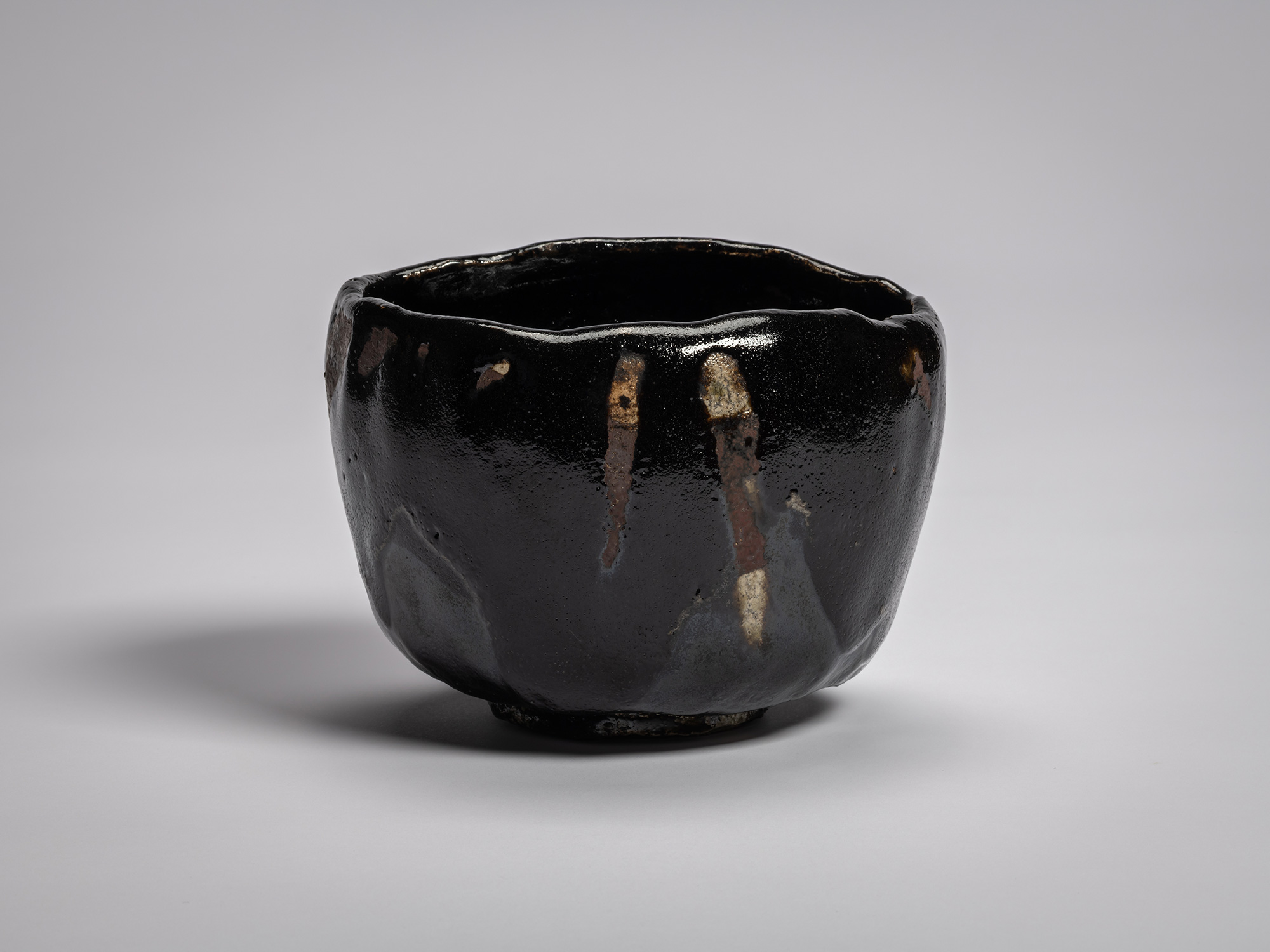 Raku XV tea bowl Usokuseki (“Traces of Rain”) with a hand-formed, slightly tapering cylindrical...