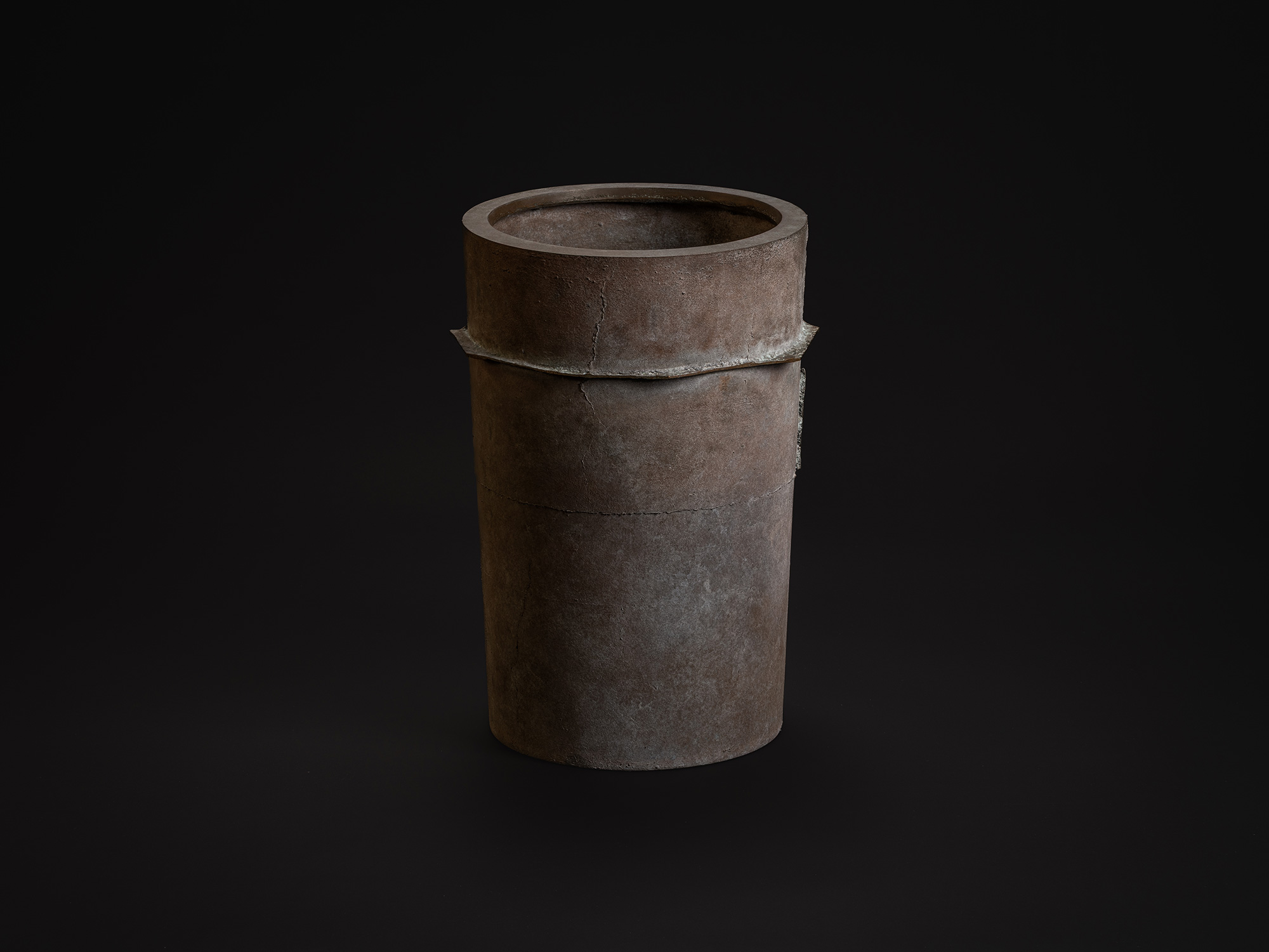 Vessel with an Axis by Koji Hatakeyama, a tall cylindrical bronze form with a softly weathered...