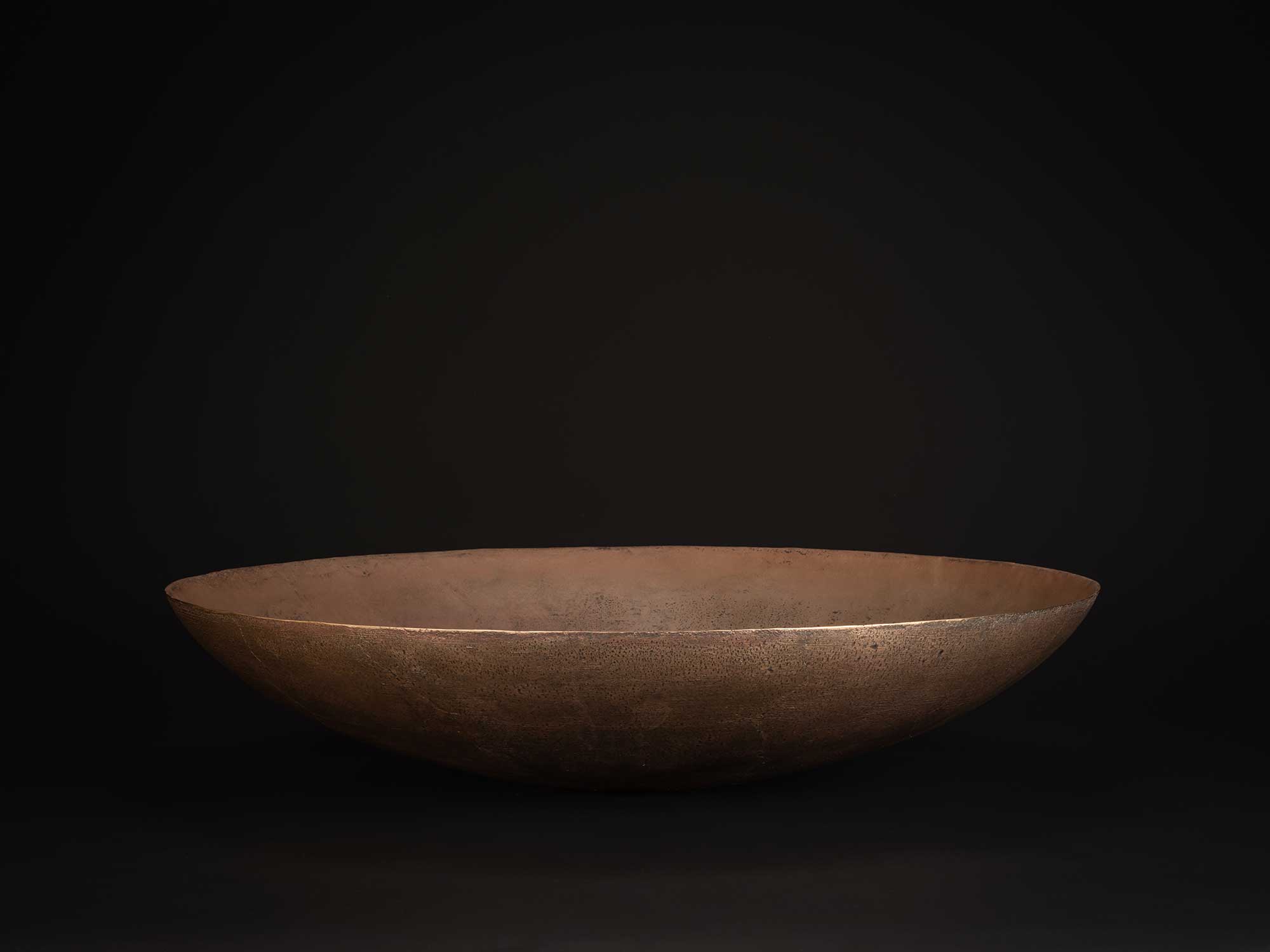 Bronze No. 21 by Hatakeyama, a low, wide bronze vessel with a gently flaring rim and shallow profile,...