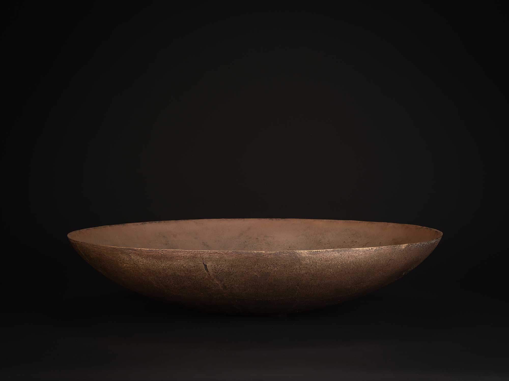 Bronze No. 21 by Hatakeyama, a low, wide bronze vessel with a gently flaring rim and shallow profile,...
