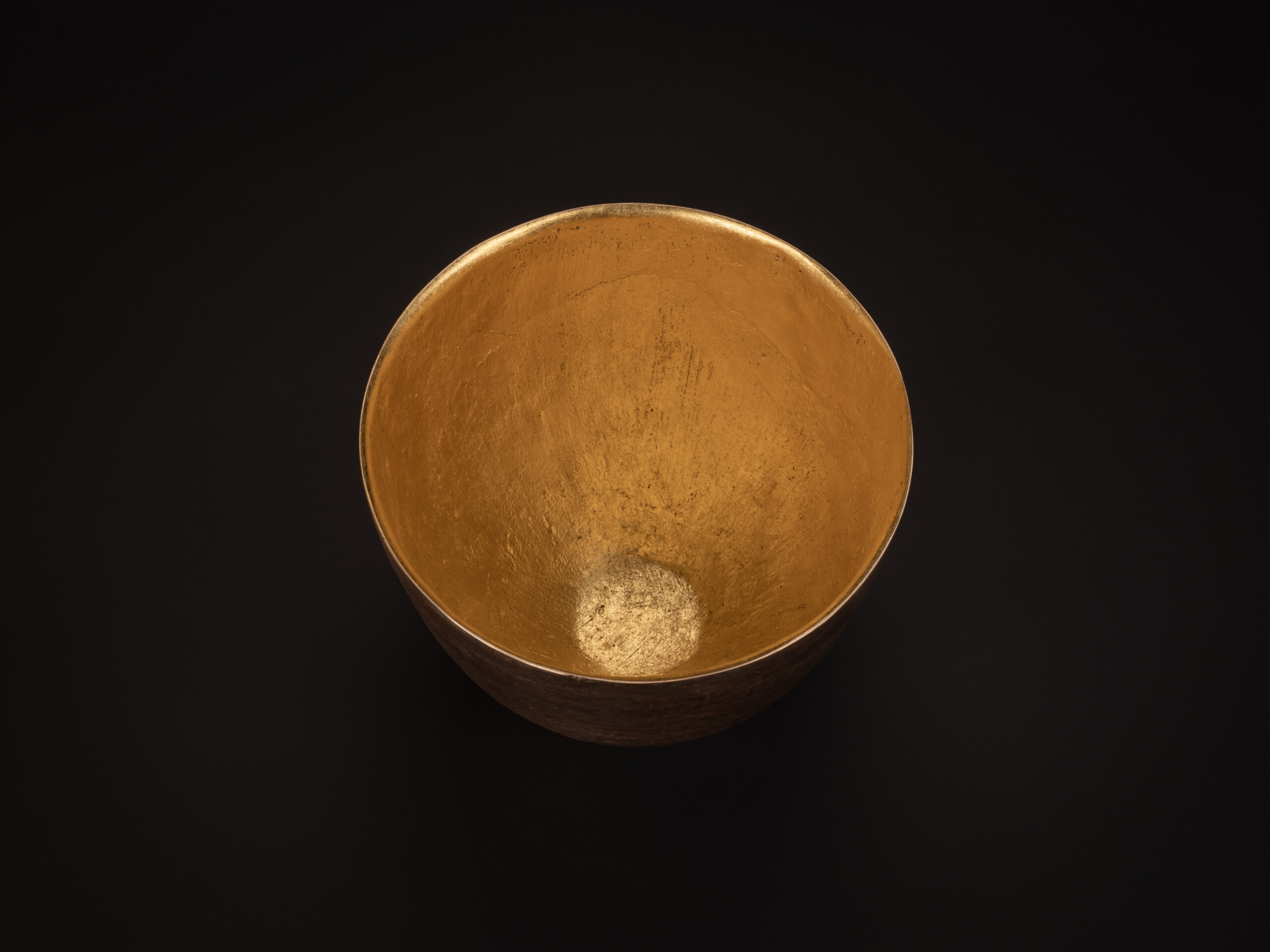 Top view of a bronze bowl by Koji Hatakeyama showing a wide circular opening and gently sloping...