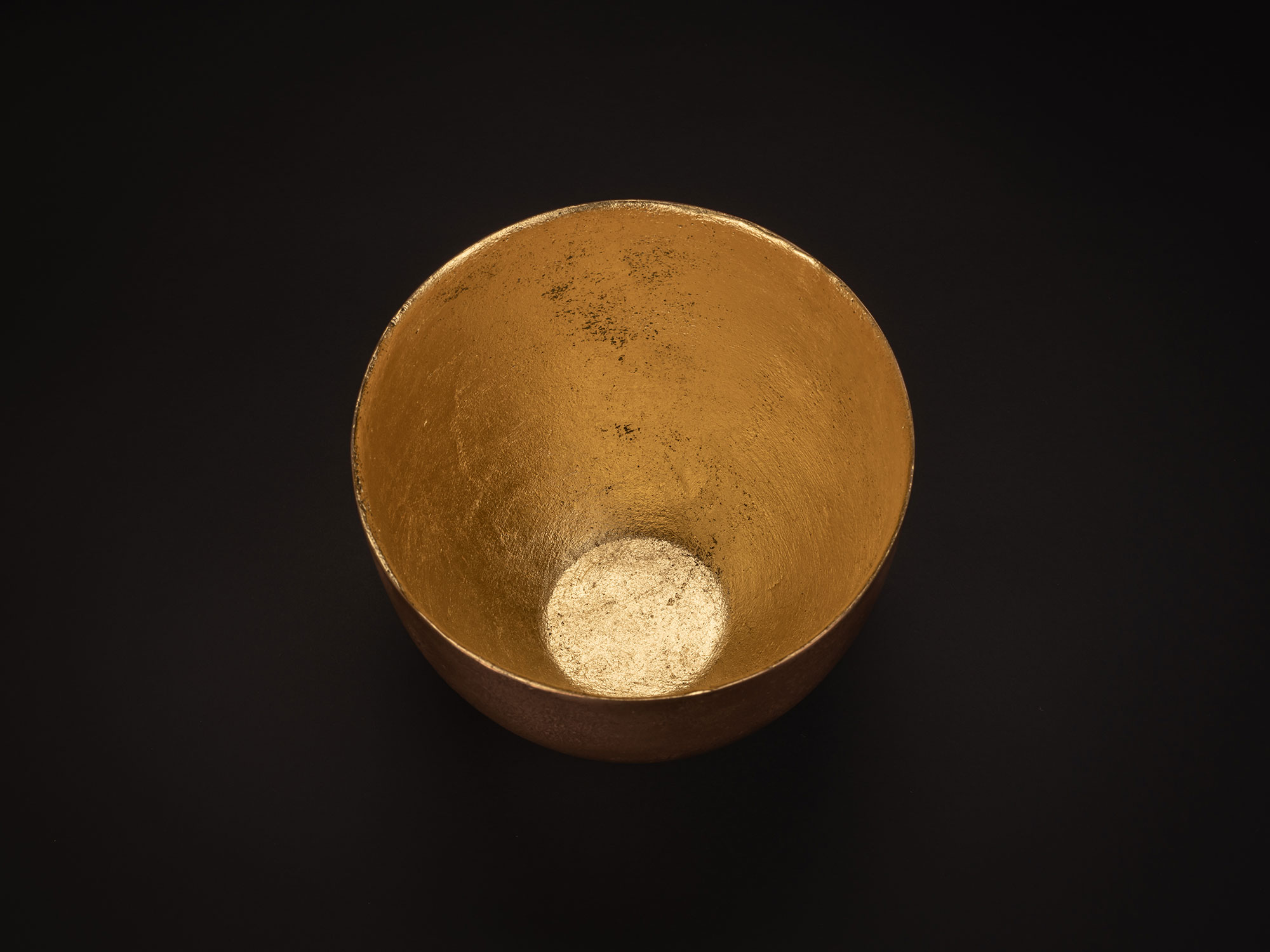 Top view of a bronze bowl by Koji Hatakeyama showing a wide circular opening and gently sloping...