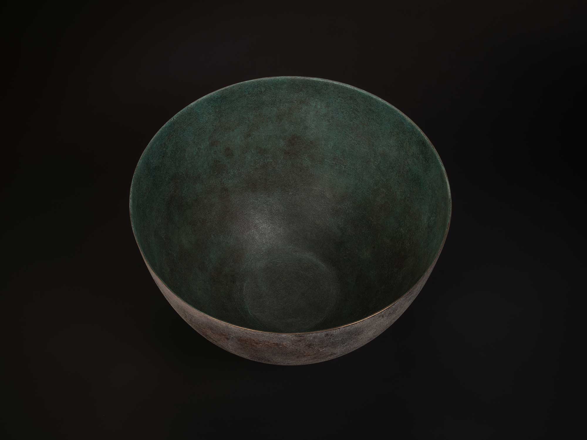 Interior view of Bronze No. 2 by Koji Hatakeyama, showing a wide circular opening and gently curving...