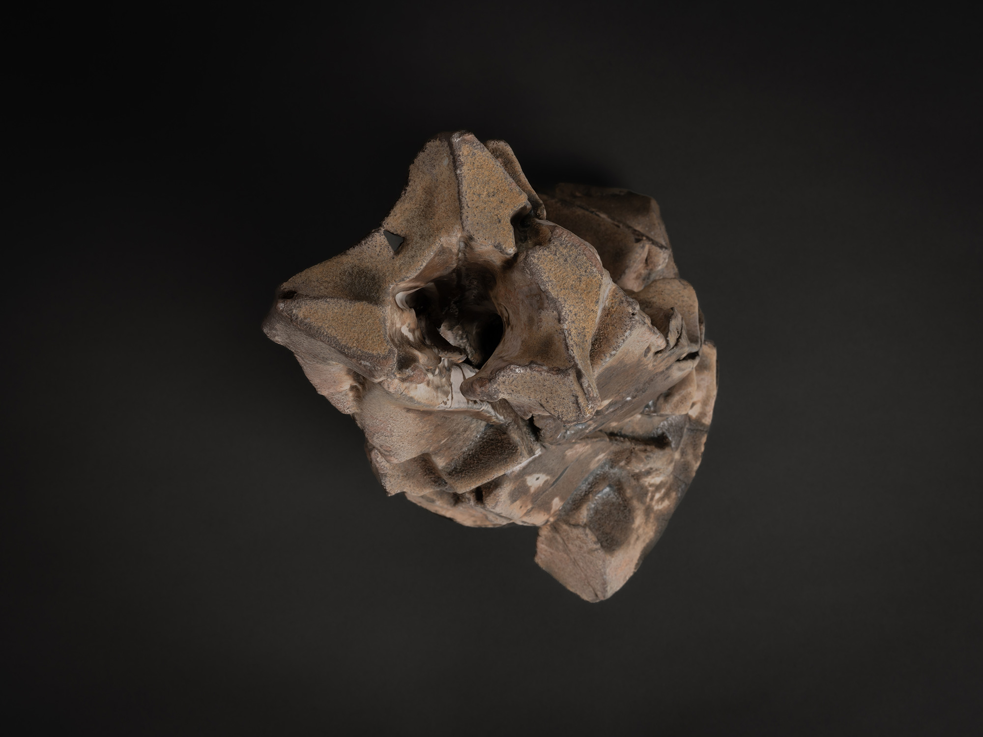 Aerial view of Vertical ceramic sculpture by Shōzō Michikawa featuring angular, folded planes and...