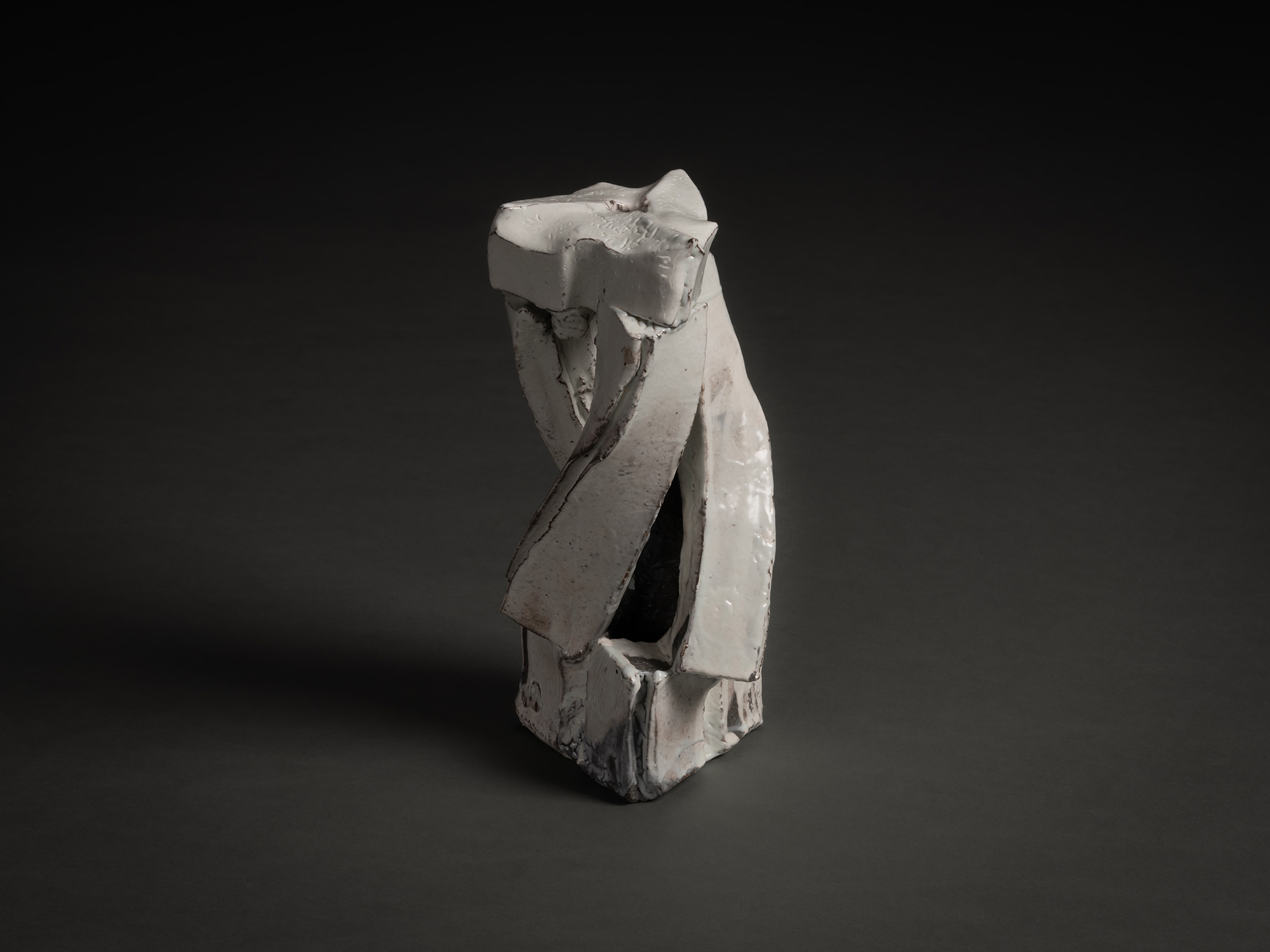 Kohiki Sculptural Form by Michikawa is a small ceramic sculpture with a twisting vertical composition,...