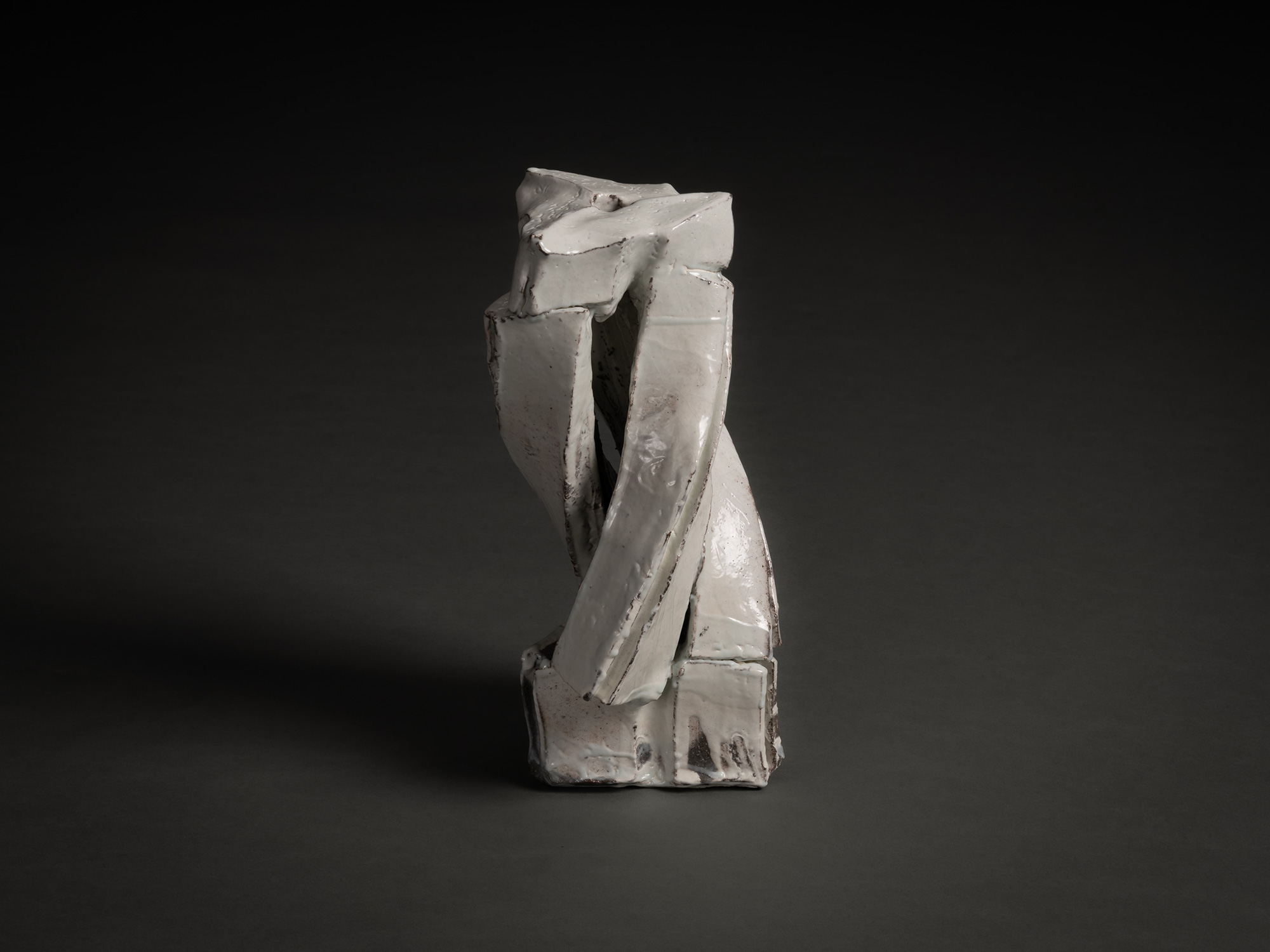 Kohiki Sculptural Form by Michikawa is a small ceramic sculpture with a twisting, vertical composition,...