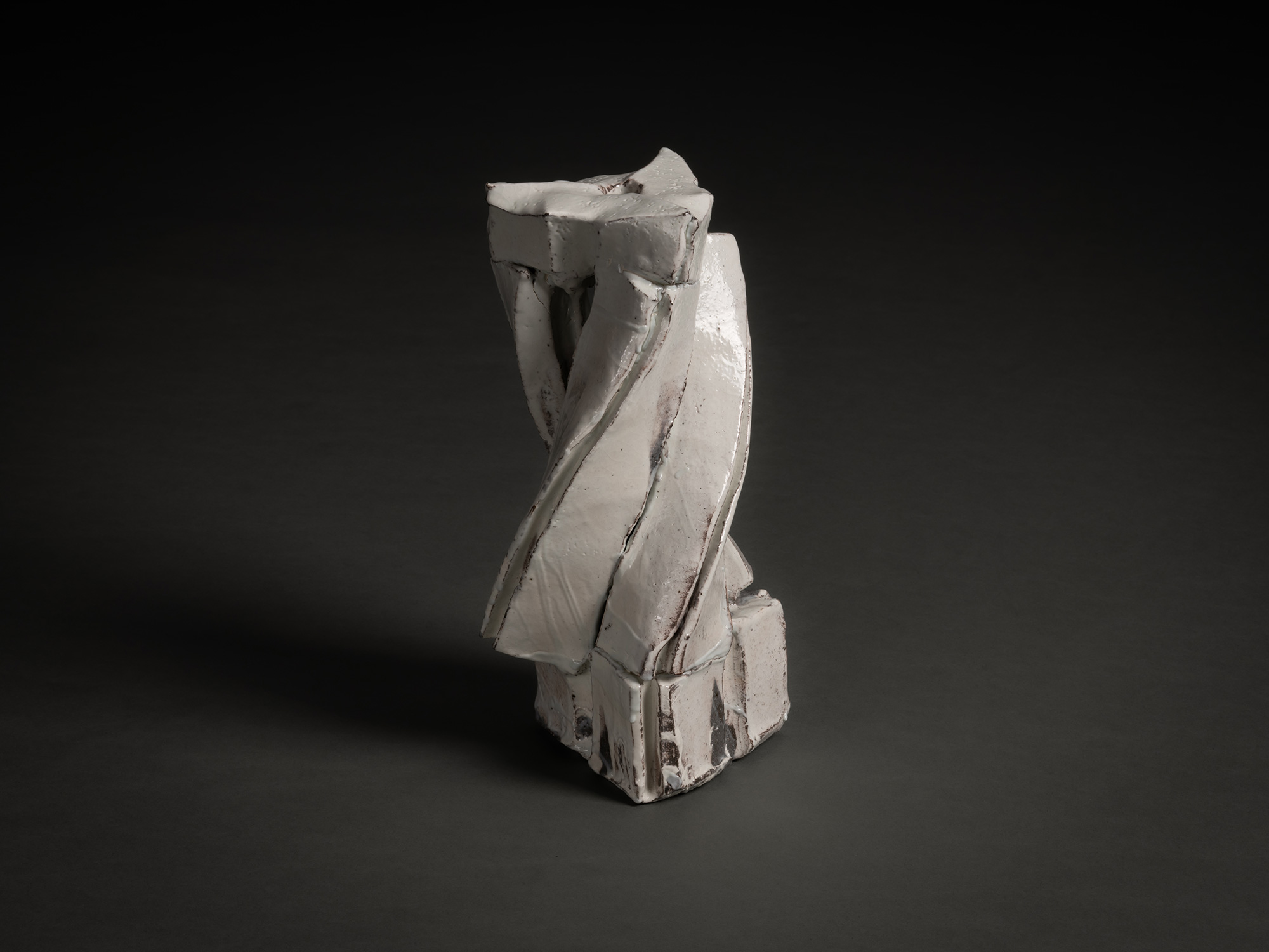 Kohiki Sculptural Form by Michikawa is a small ceramic sculpture with a twisting vertical composition,...