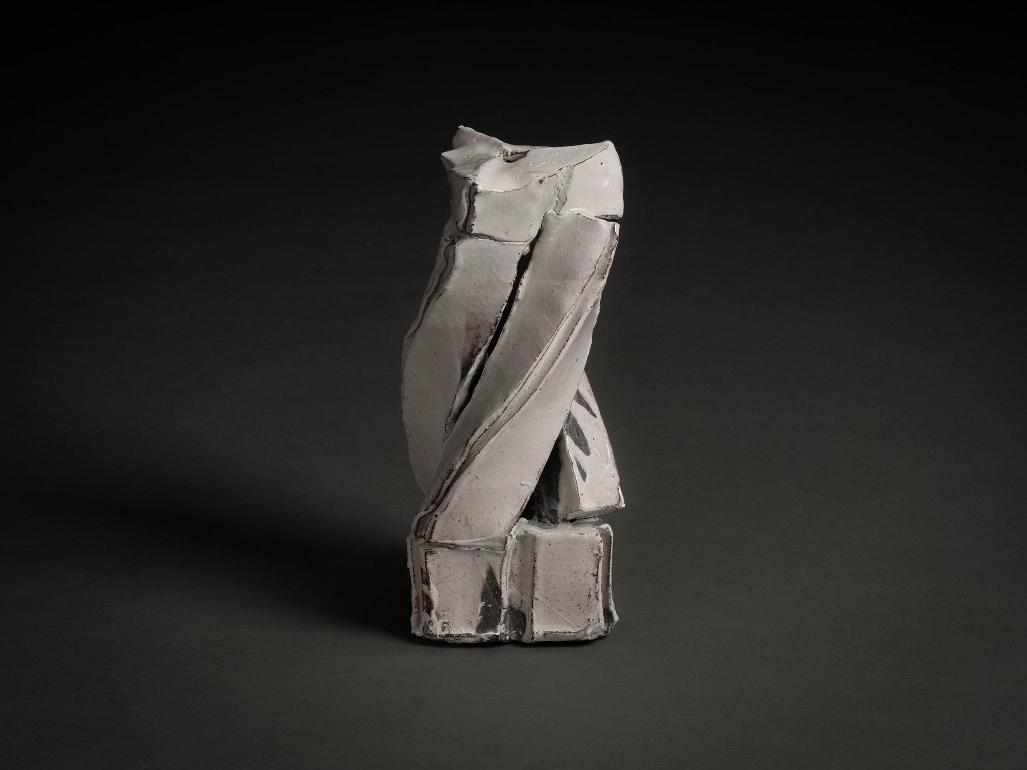 Kohiki Sculptural Form by Michikawa is a small ceramic sculpture with a twisting, vertical composition,...