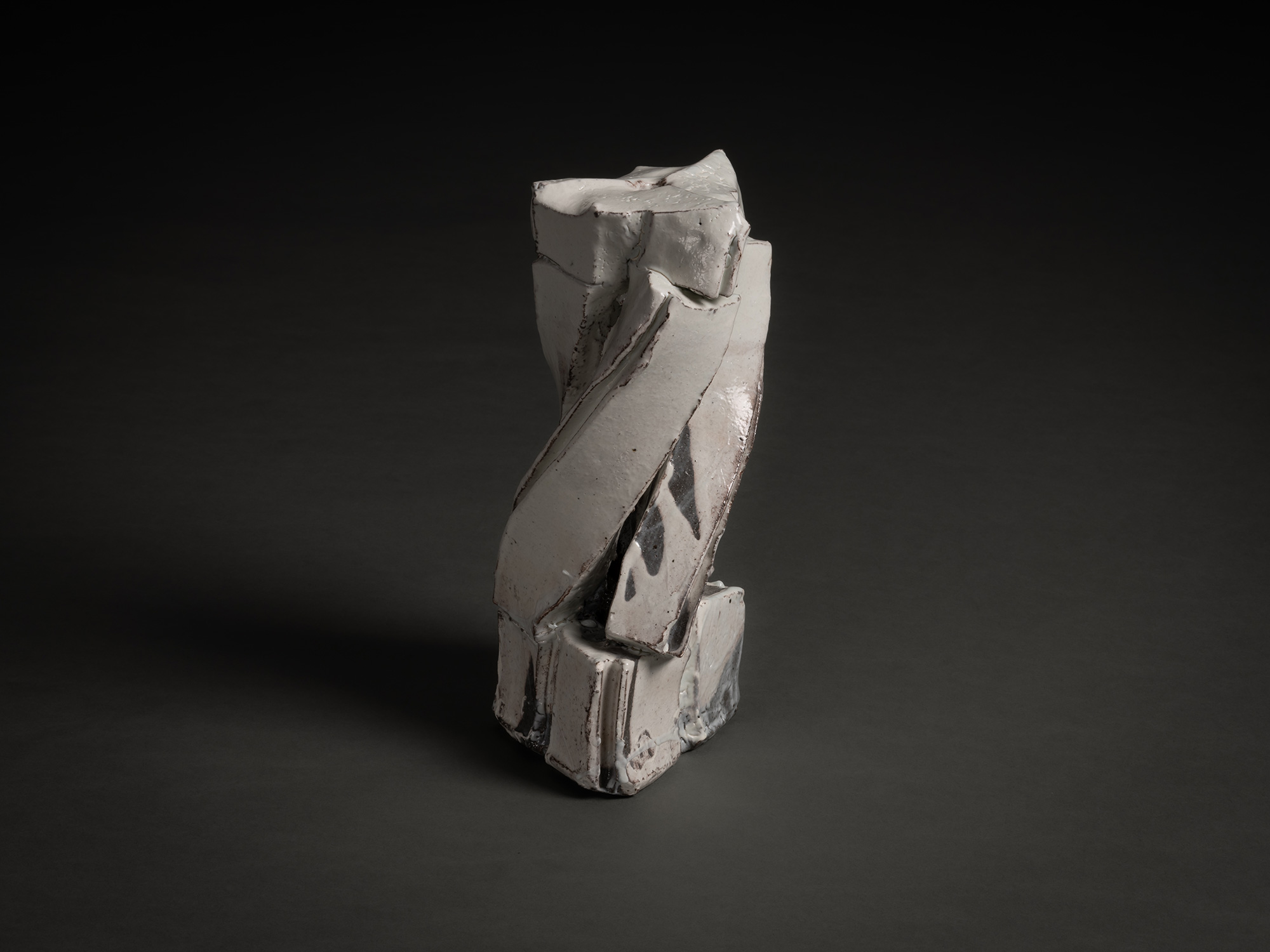Kohiki Sculptural Form by Michikawa is a small ceramic sculpture with a twisting, vertical composition,...