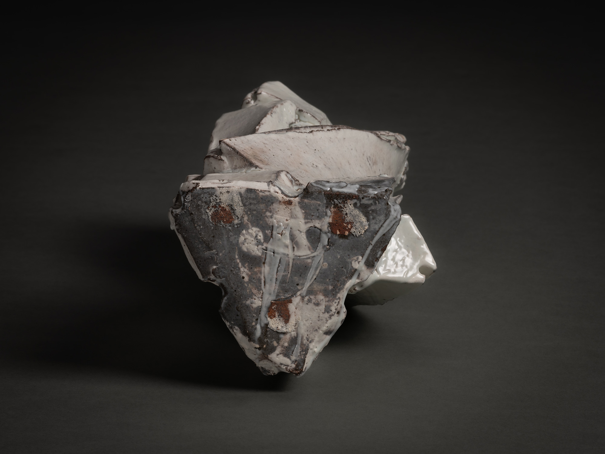 Bottom view of Kohiki Sculptural Form by Michikawa, showing an irregular, faceted base with rough...