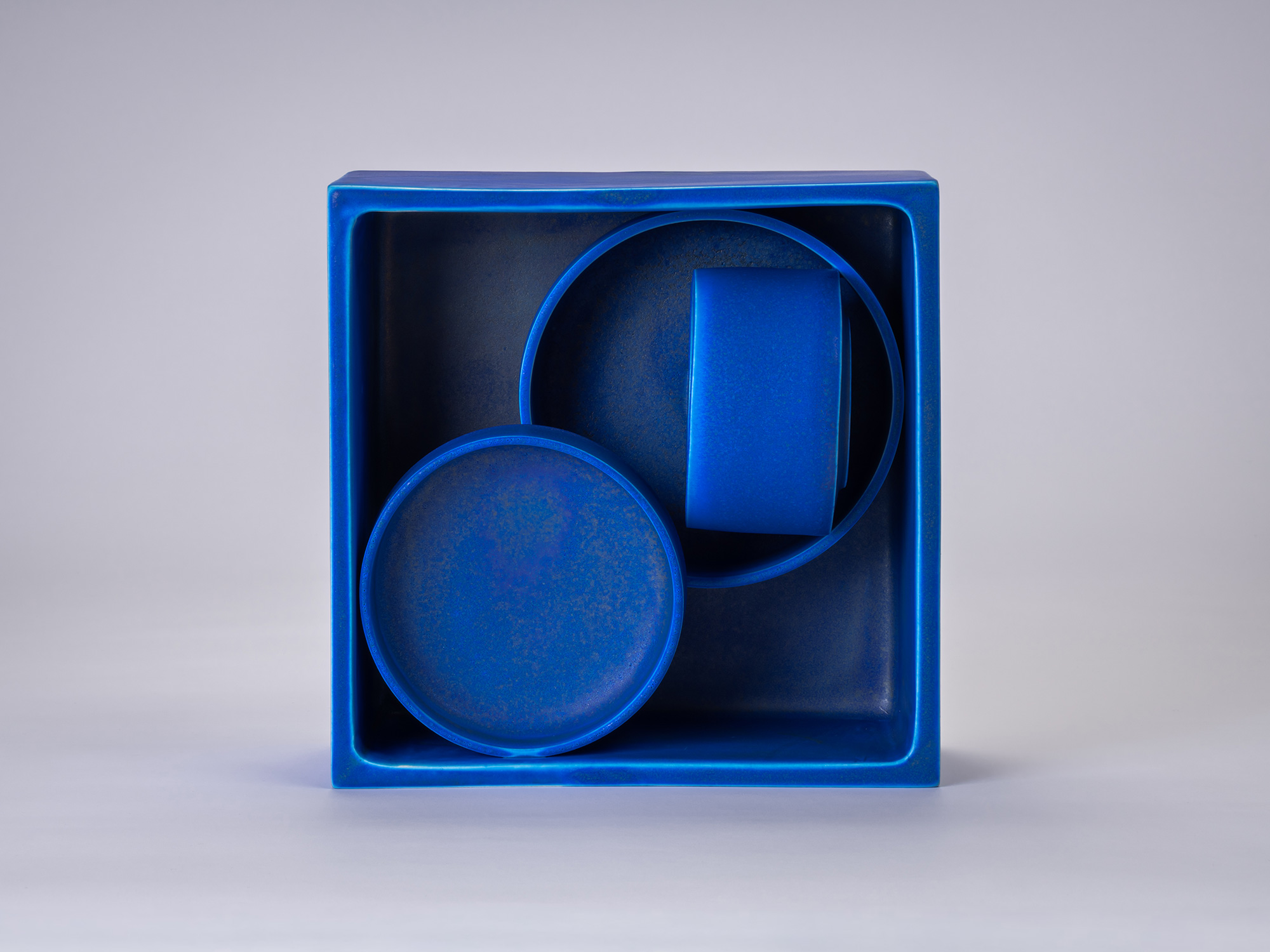MONO-BLUE by Takahiro Kondo, a monochromatic ceramic composition in vivid cobalt blue, shown against...