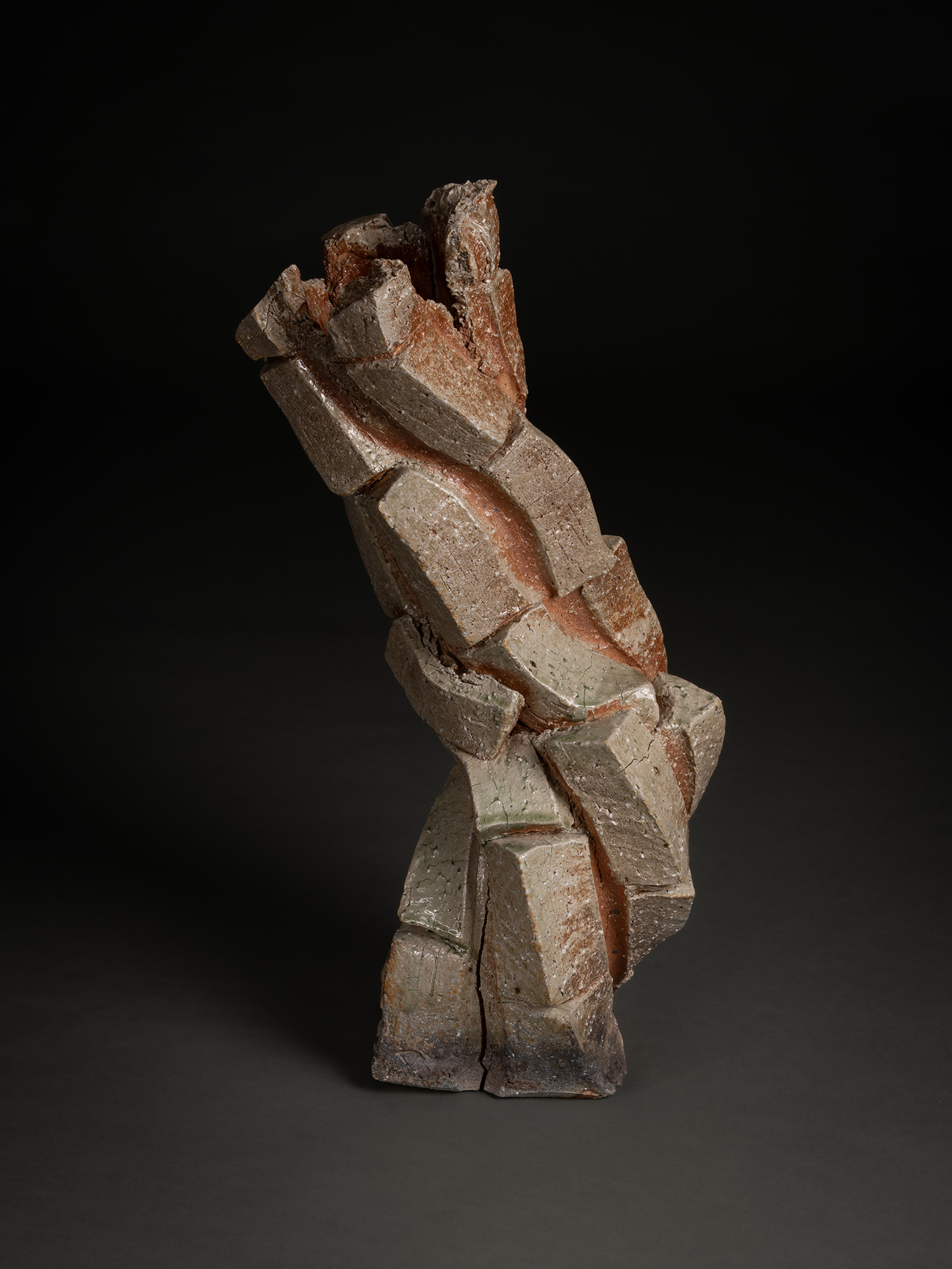 Natural ash sculptural form by Shōzō Michikawa, an upright, twisting ceramic structure composed...