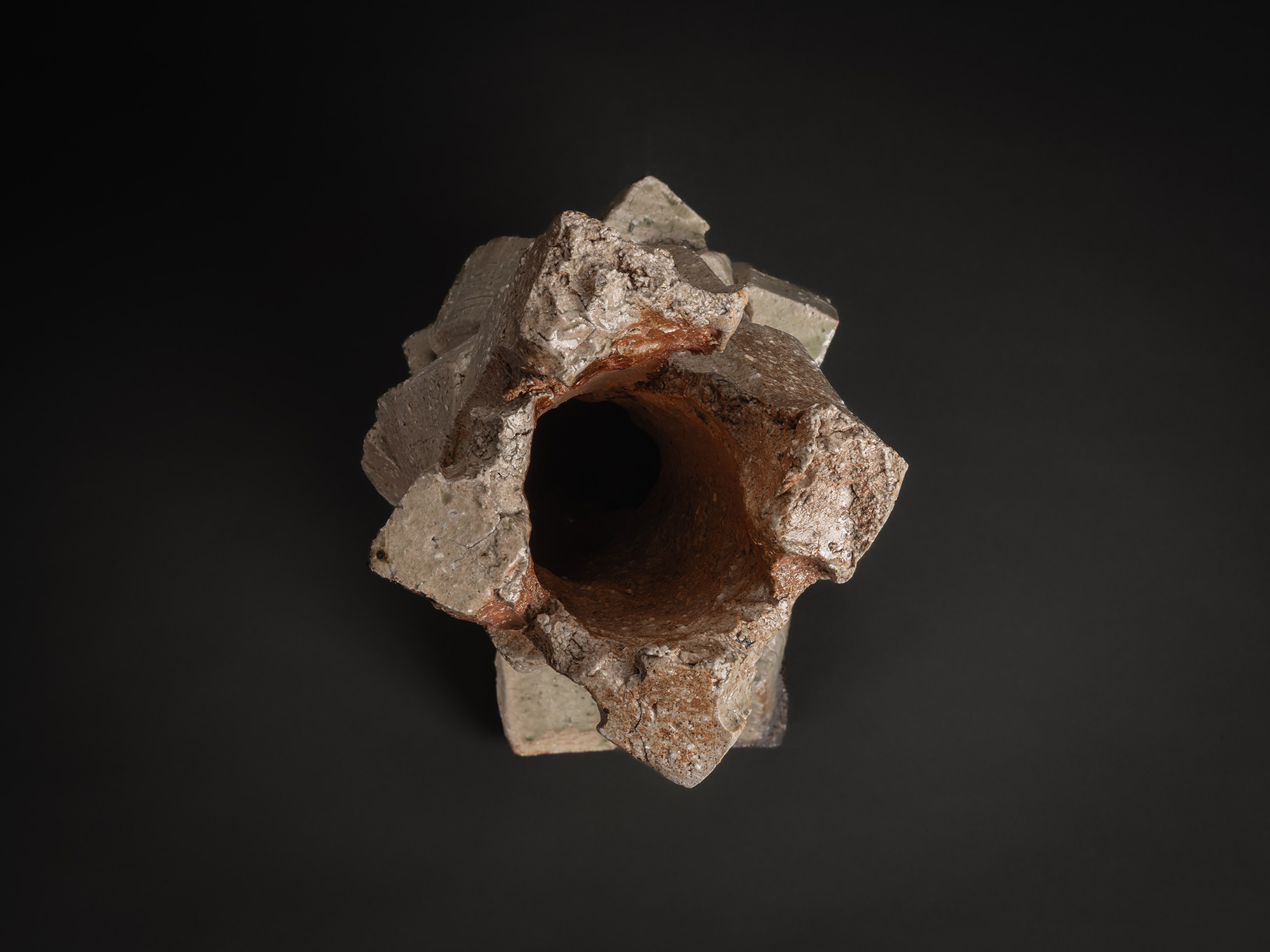 Aerial view of a natural ash sculptural form by Shōzō Michikawa, showing a star-like opening at...