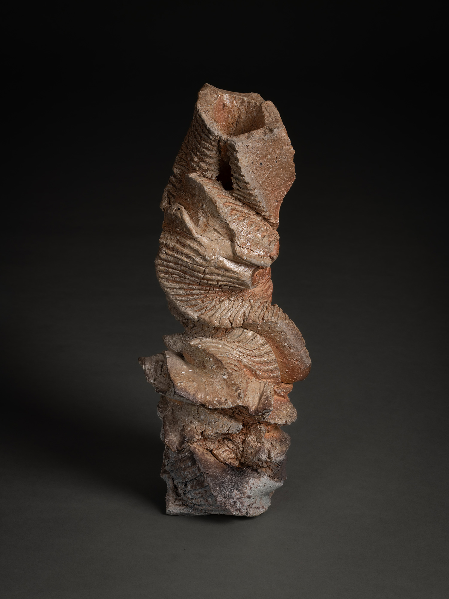 Natural ash sculptural form by Shōzō Michikawa, a vertically oriented ceramic with a twisting,...