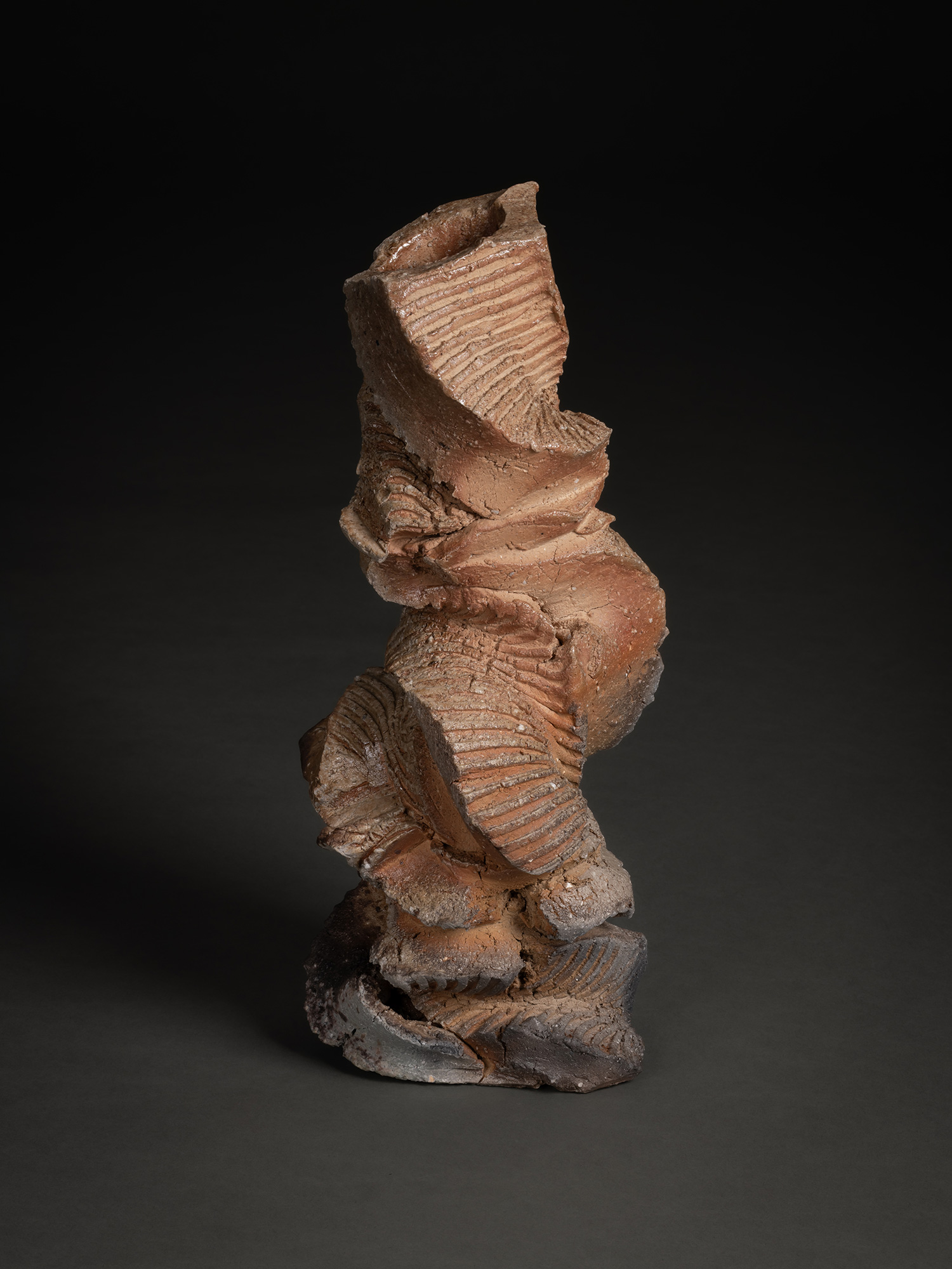 Natural ash sculptural form by Shōzō Michikawa, a vertically oriented ceramic with a twisting,...