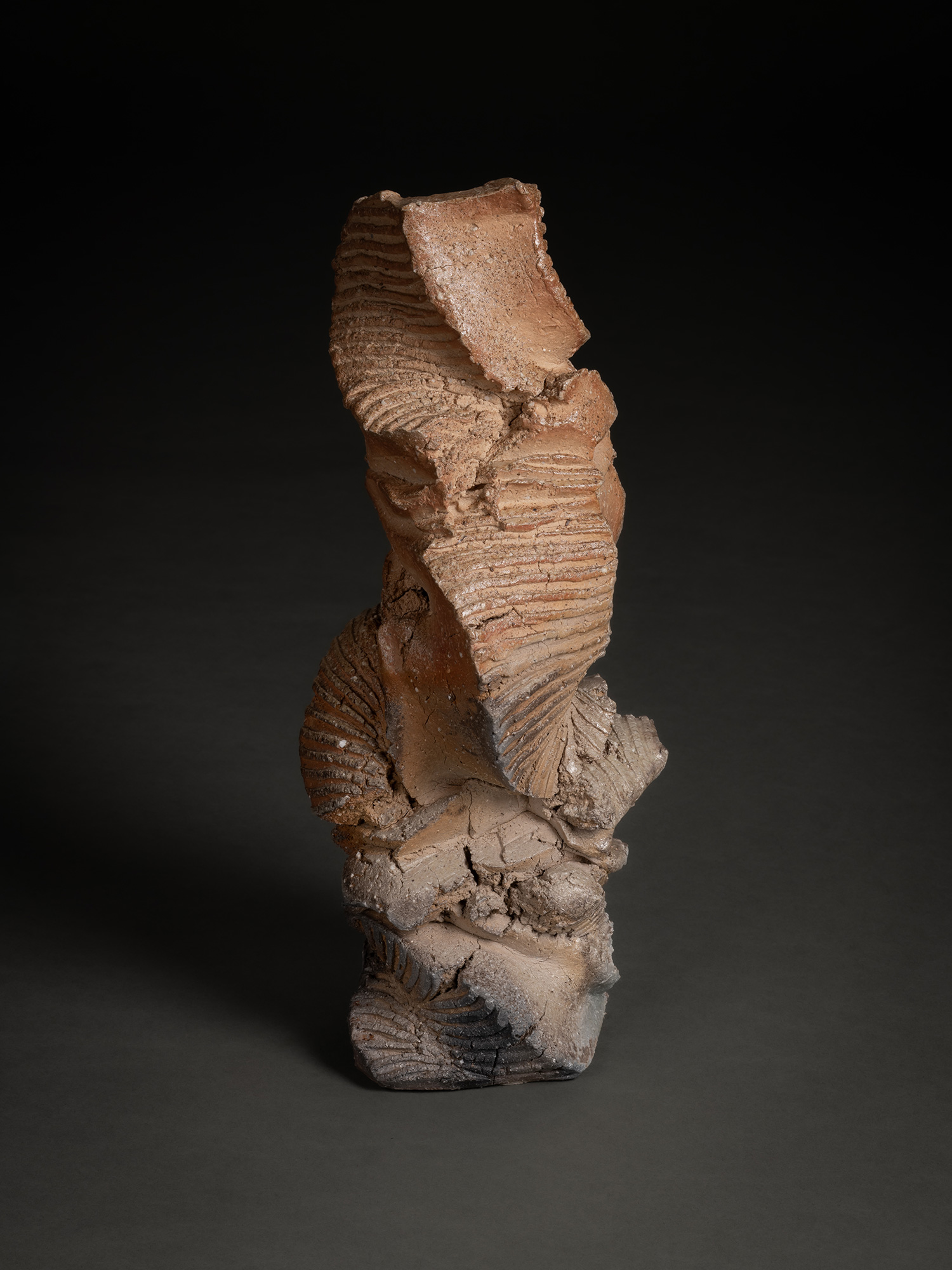 Natural ash sculptural form by Shōzō Michikawa, a vertically oriented ceramic with a twisting,...