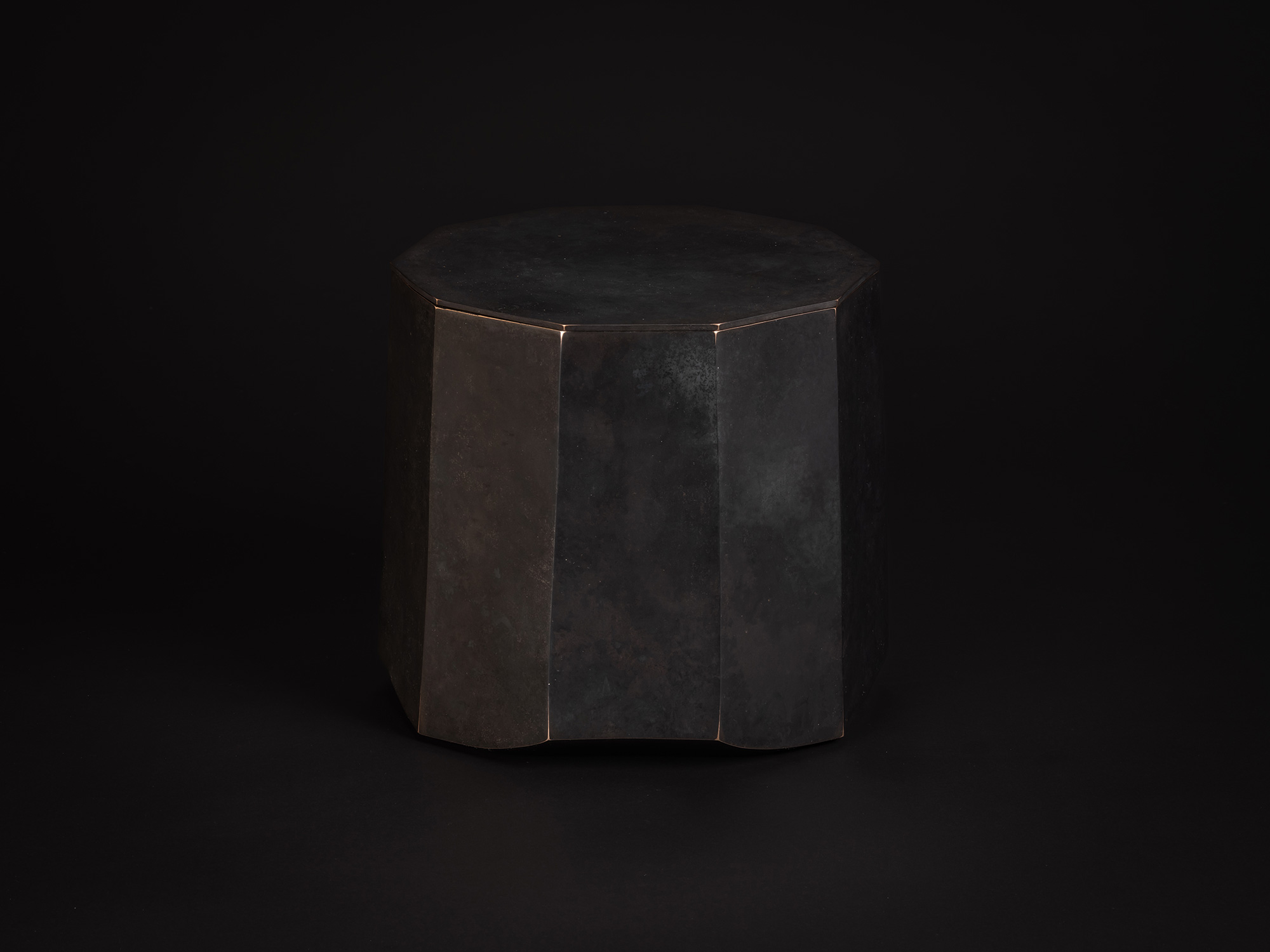 Faceted bronze vessel titled Ten Faces II by Koji Hatakeyama, with a decagonal form composed of...