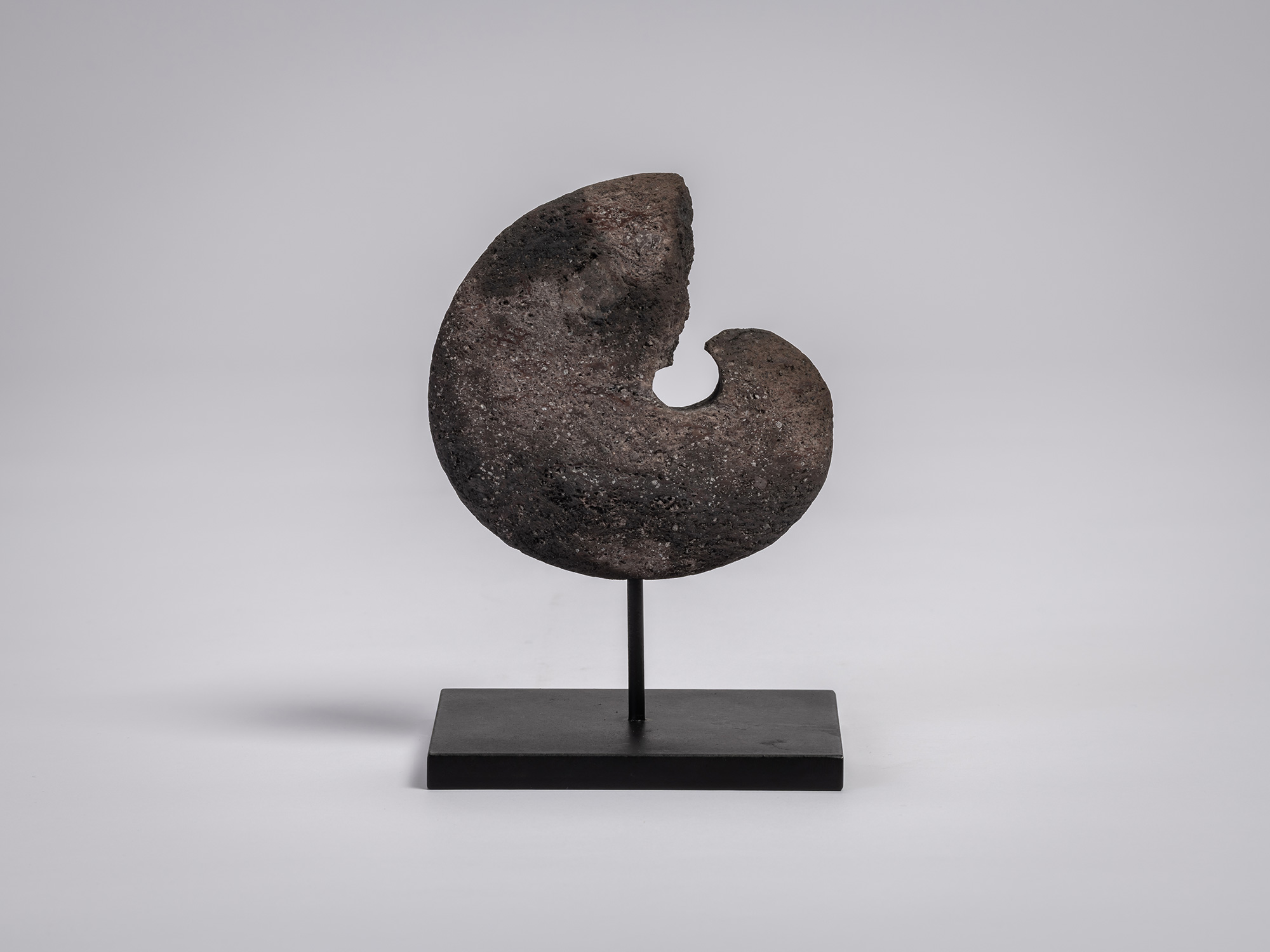 Transmigration Element Series by Masaomi Raku is a circular ceramic form with a crescent-shaped...