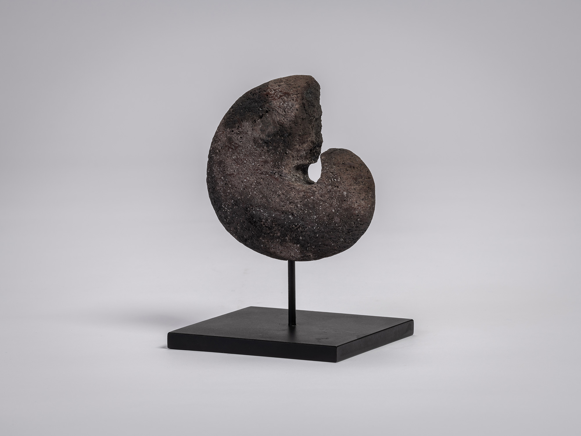 Transmigration Element Series by Masaomi Raku is a circular ceramic form with a crescent-shaped...