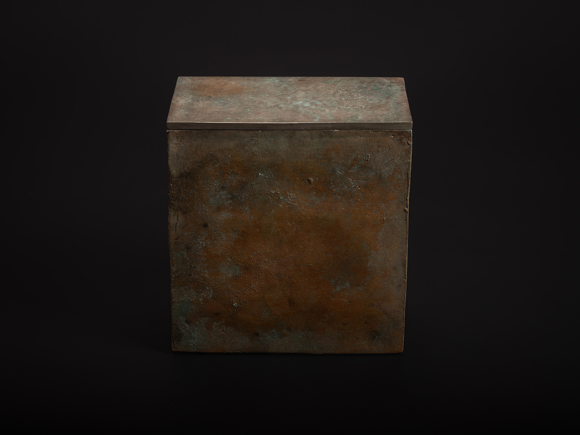 Cupronickel Box by Koji Hatakeyama featuring a faceted metal vessel with angular geometric planes,...