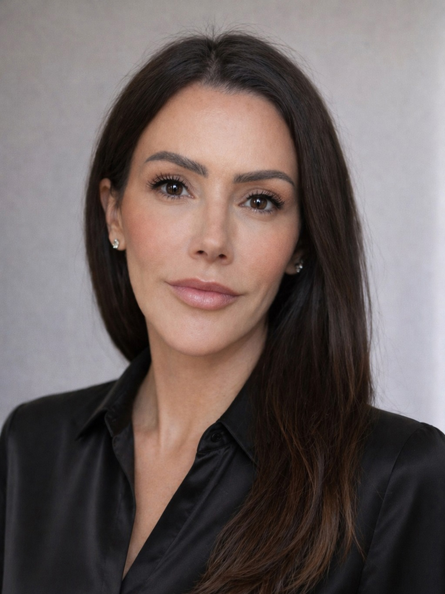 Image of Dawn Searcy, Caucasian female with dark shoulder length hair wearing a black blouse.