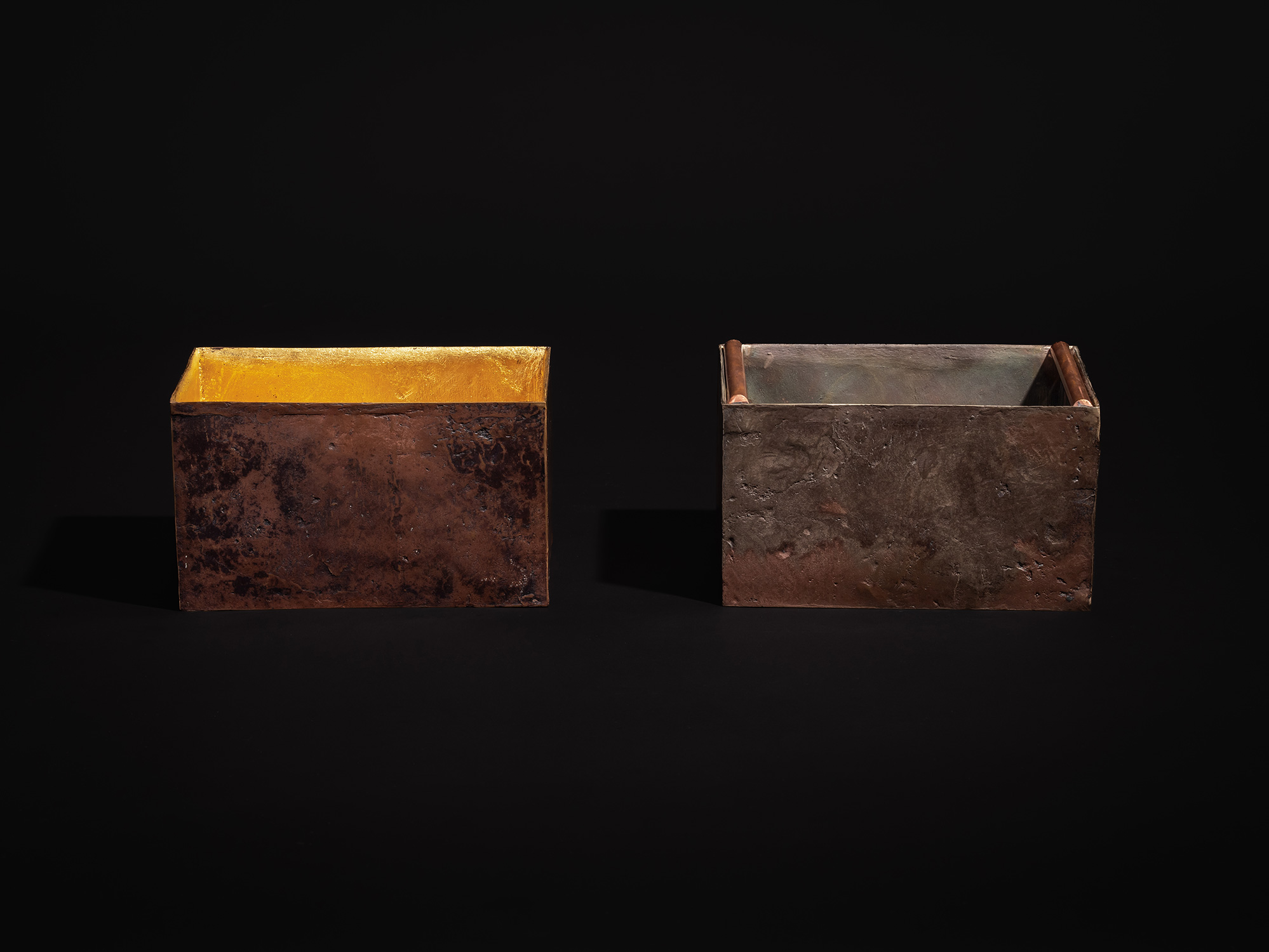A straight-on, eye-level view of Koji Hatakeyama's bronze box Doing Little - Small photographed...