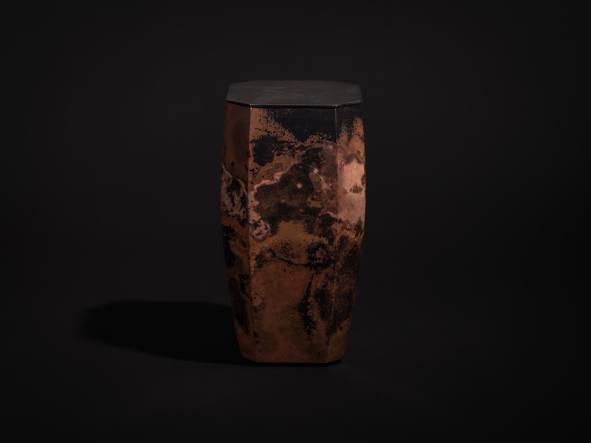 Three-quarter view of Eight Faces XVI by Koji Hatakeyama highlighting the vessel’s geometric silhouette...