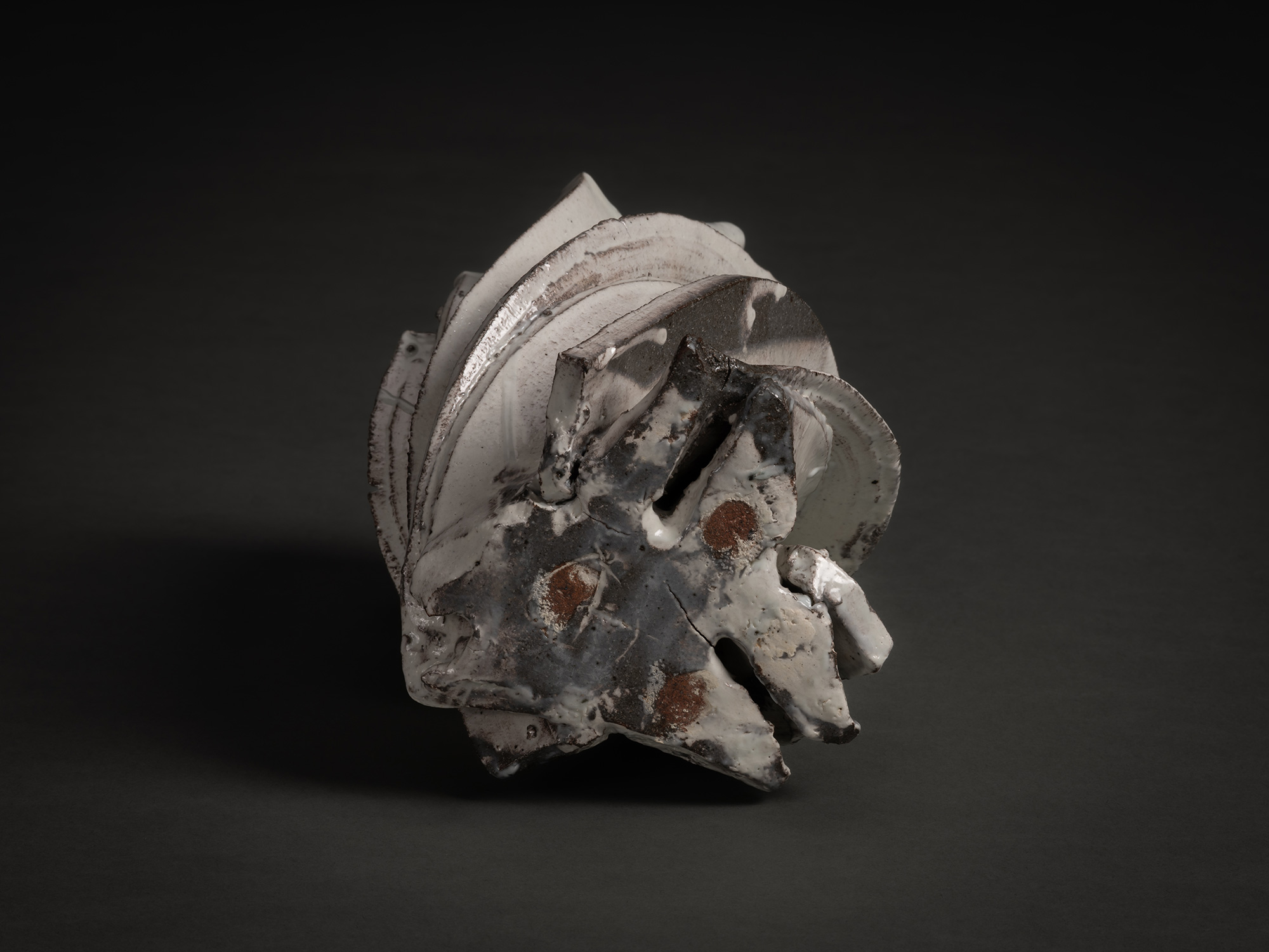 Foot view of Kohiki Sculptural Form by Shōzō Michikawa showing the underside of the twisting ceramic...