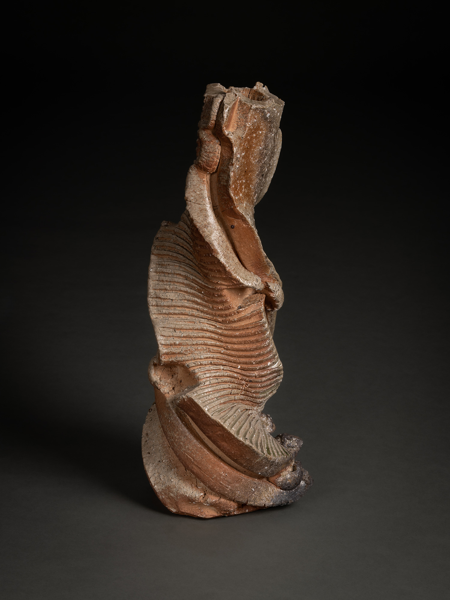Natural ash sculptural form by Shōzō Michikawa featuring a tall twisting ceramic structure with...