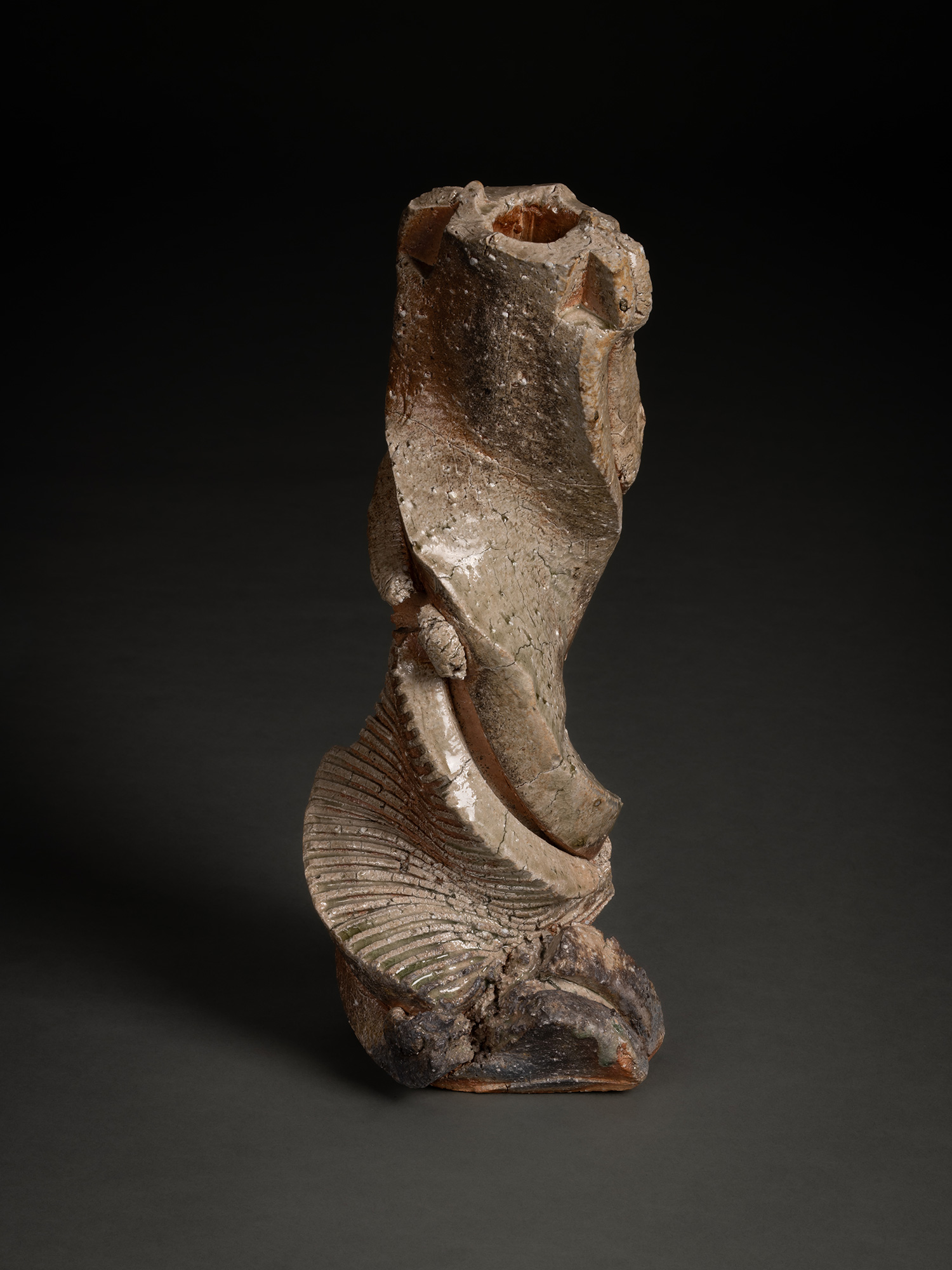 Natural ash sculptural form by Shōzō Michikawa featuring a tall twisting ceramic structure with...