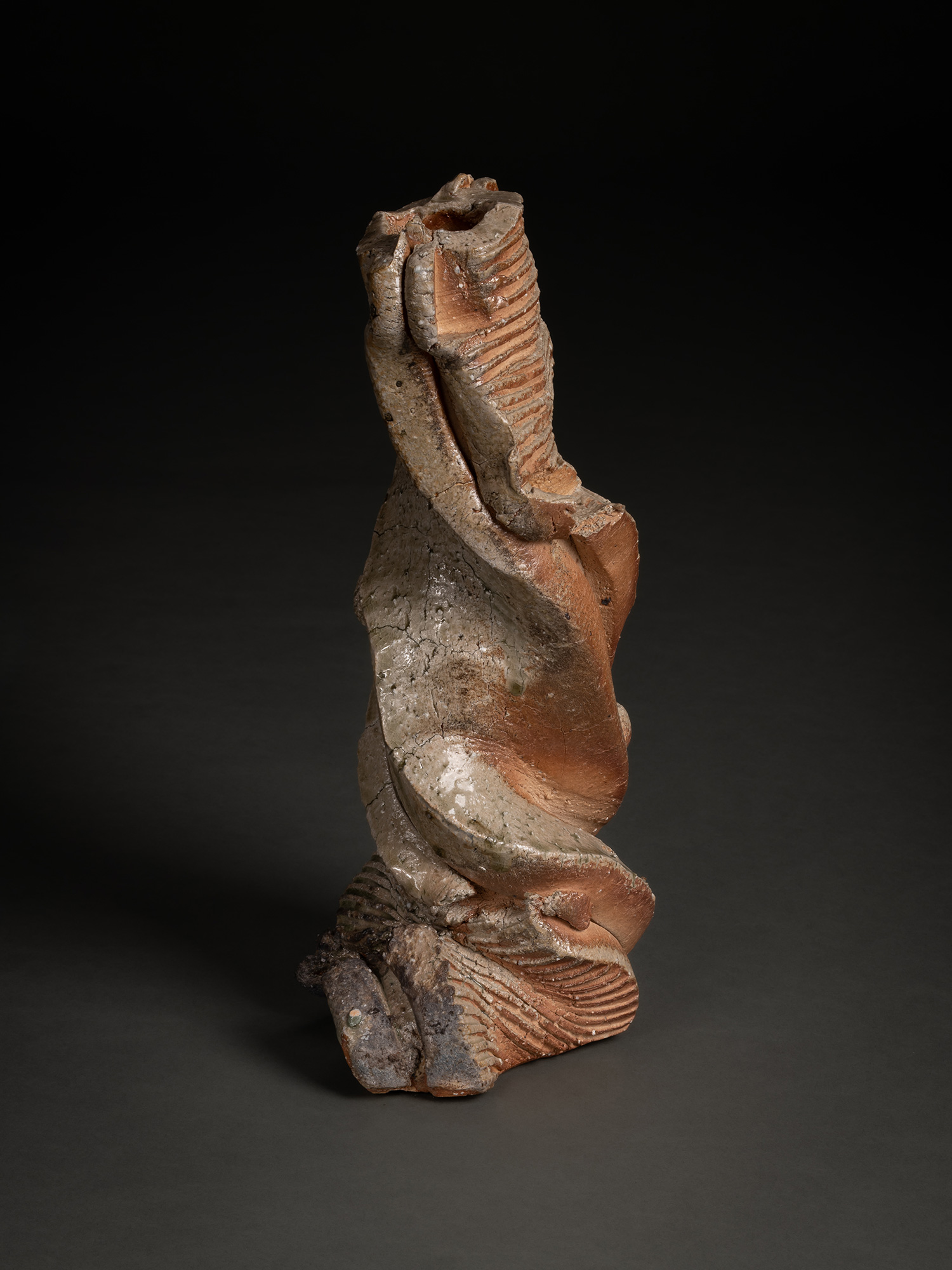 Natural ash sculptural form by Shōzō Michikawa featuring a tall twisting ceramic structure with...