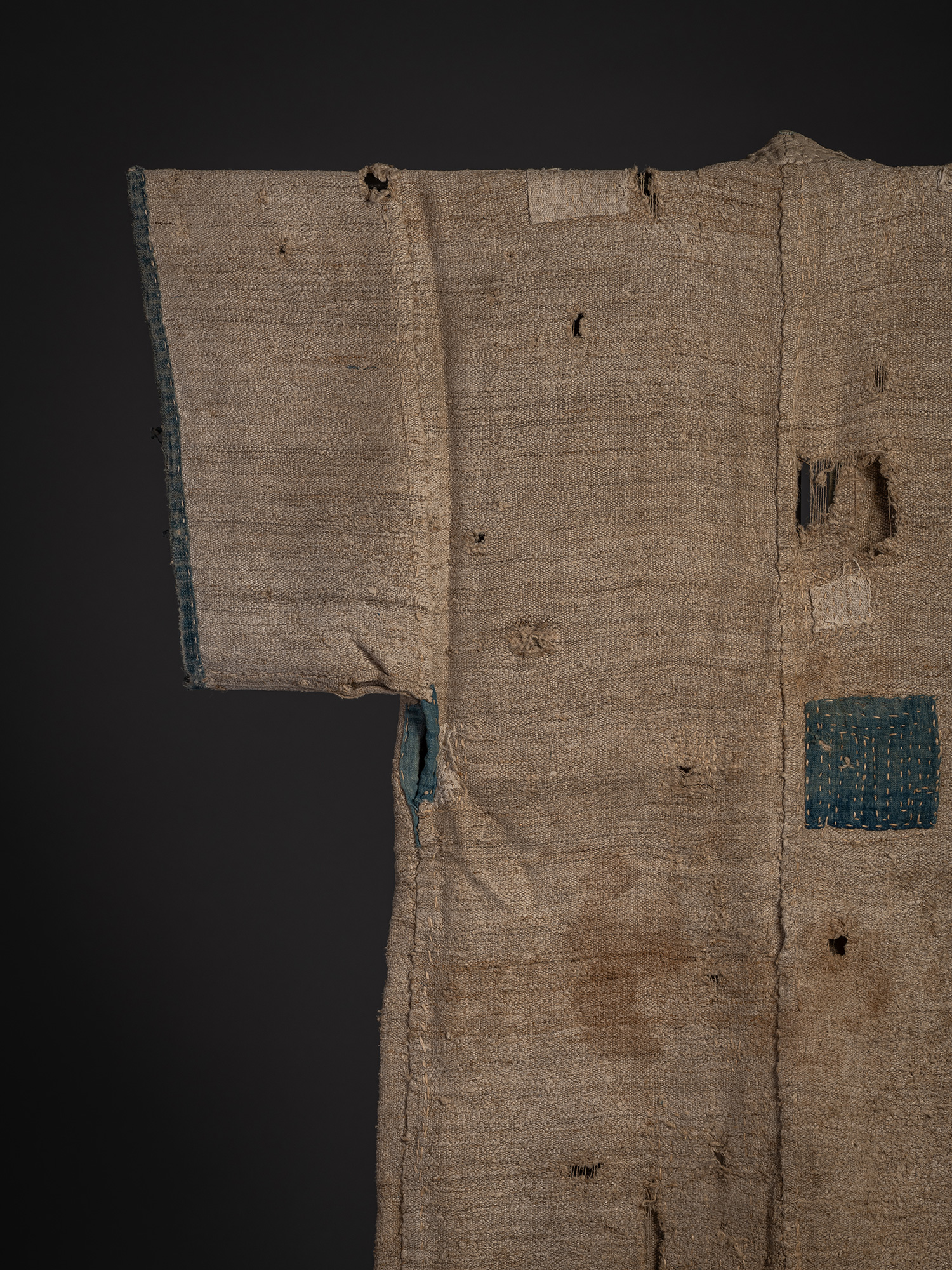 Close-up of the left side of the back of a late 19th-century okusozakkuri garment. The textile...