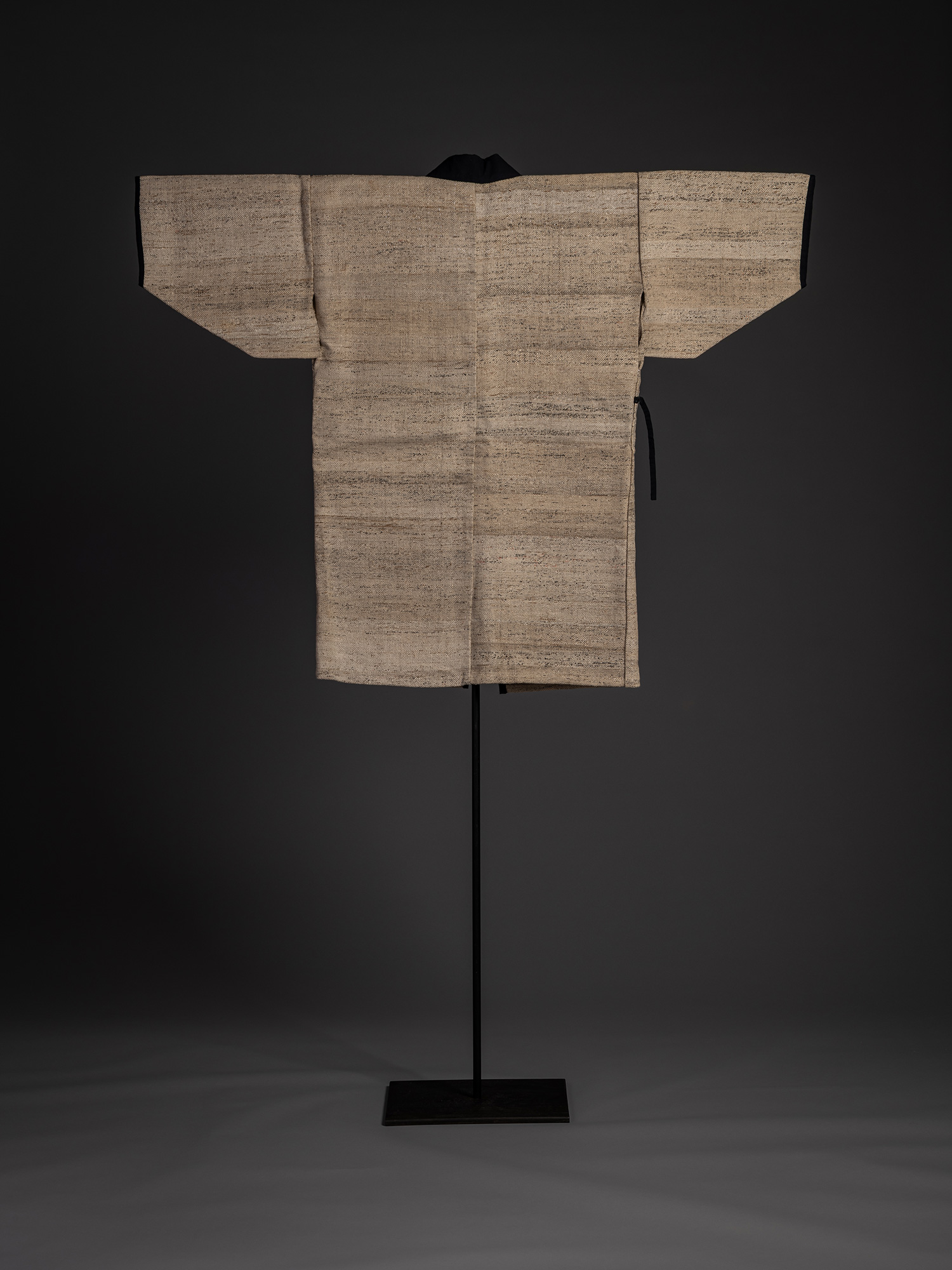 Back view of a Japanese ōtsuzure hanten woven from wisteria yarn and recycled ledger paper (washi...